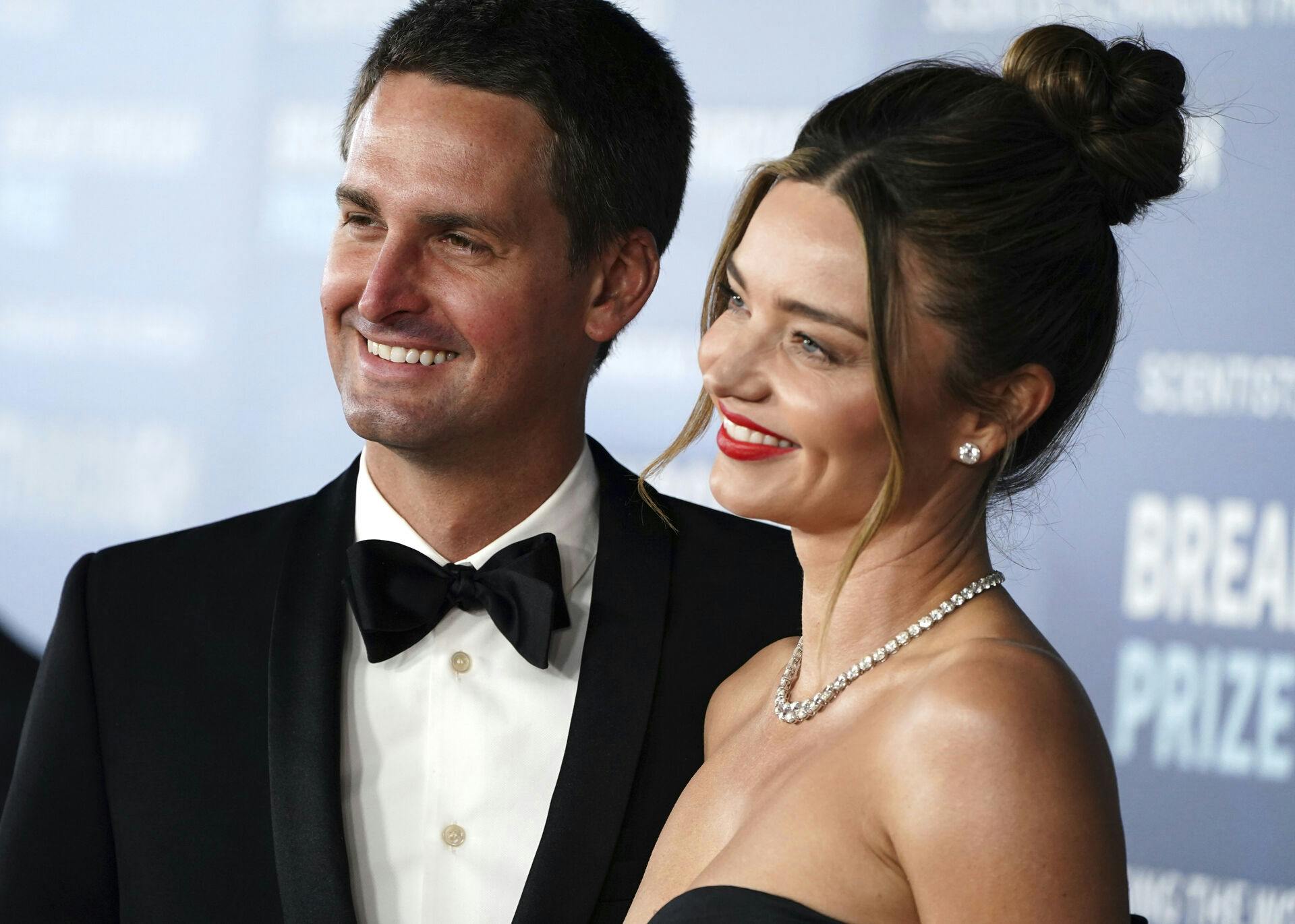 Evan Spiegel, left, and Miranda Kerr arrive at the ninth Breakthrough Prize ceremony on Saturday, April 15, 2023, at The Academy Museum of Motion Pictures in Los Angeles. (Photo by Jordan Strauss/Invision/AP)