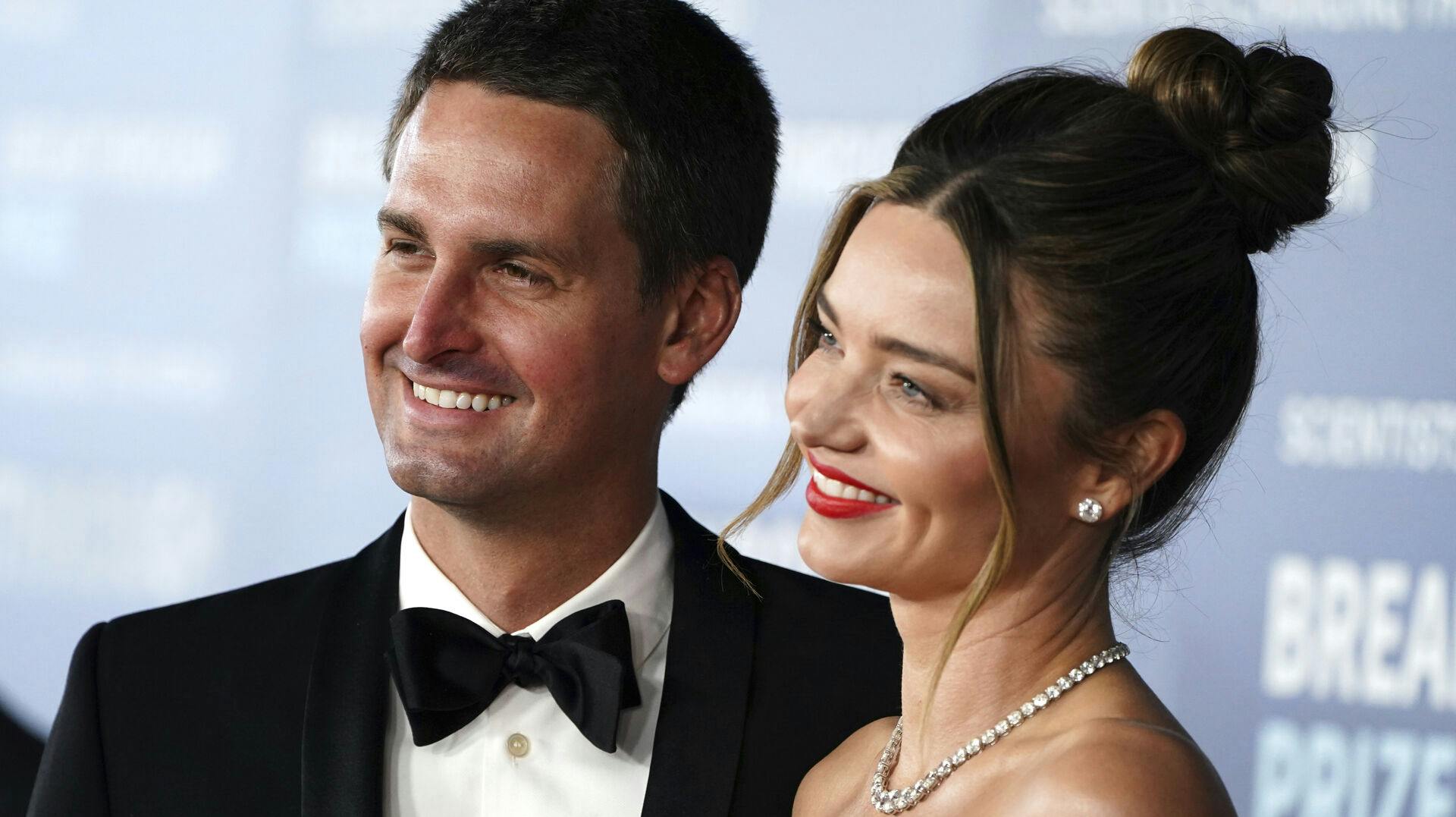 Evan Spiegel, left, and Miranda Kerr arrive at the ninth Breakthrough Prize ceremony on Saturday, April 15, 2023, at The Academy Museum of Motion Pictures in Los Angeles. (Photo by Jordan Strauss/Invision/AP)
