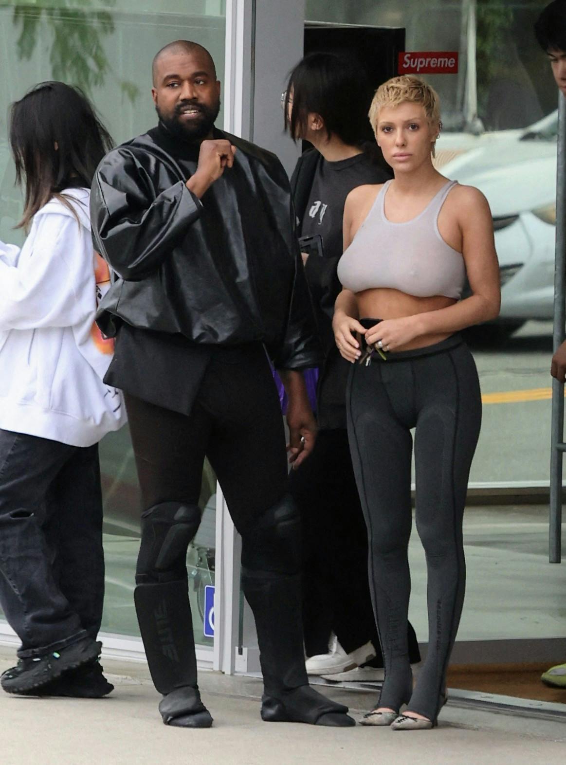 Kanye West seen in good spirits while shopping SUPREME and showing off his hummer with wife Bianca and friend ahead of his sock shoe launch. 13 May 2023 Pictured: Kanye West and Bianca Censori. Photo credit: APEX / MEGA TheMegaAgency.com +1 888 505 6342 (Mega Agency TagID: MEGA981411_001.jpg) [Photo via Mega Agency]