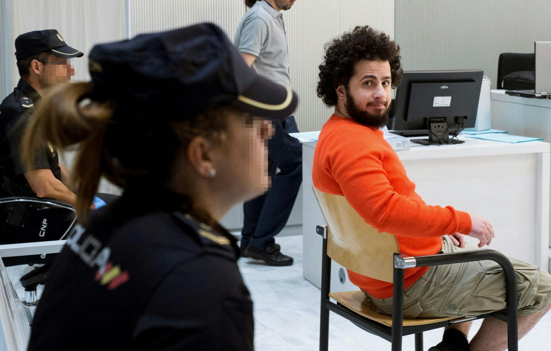 Danish Ahmed Samsam poses at a court in Madrid on June 12, 2018 during his trial on charges of having fought in the ranks of the Islamic State for more than three years. Luca Piergiovanni / POOL / AFP