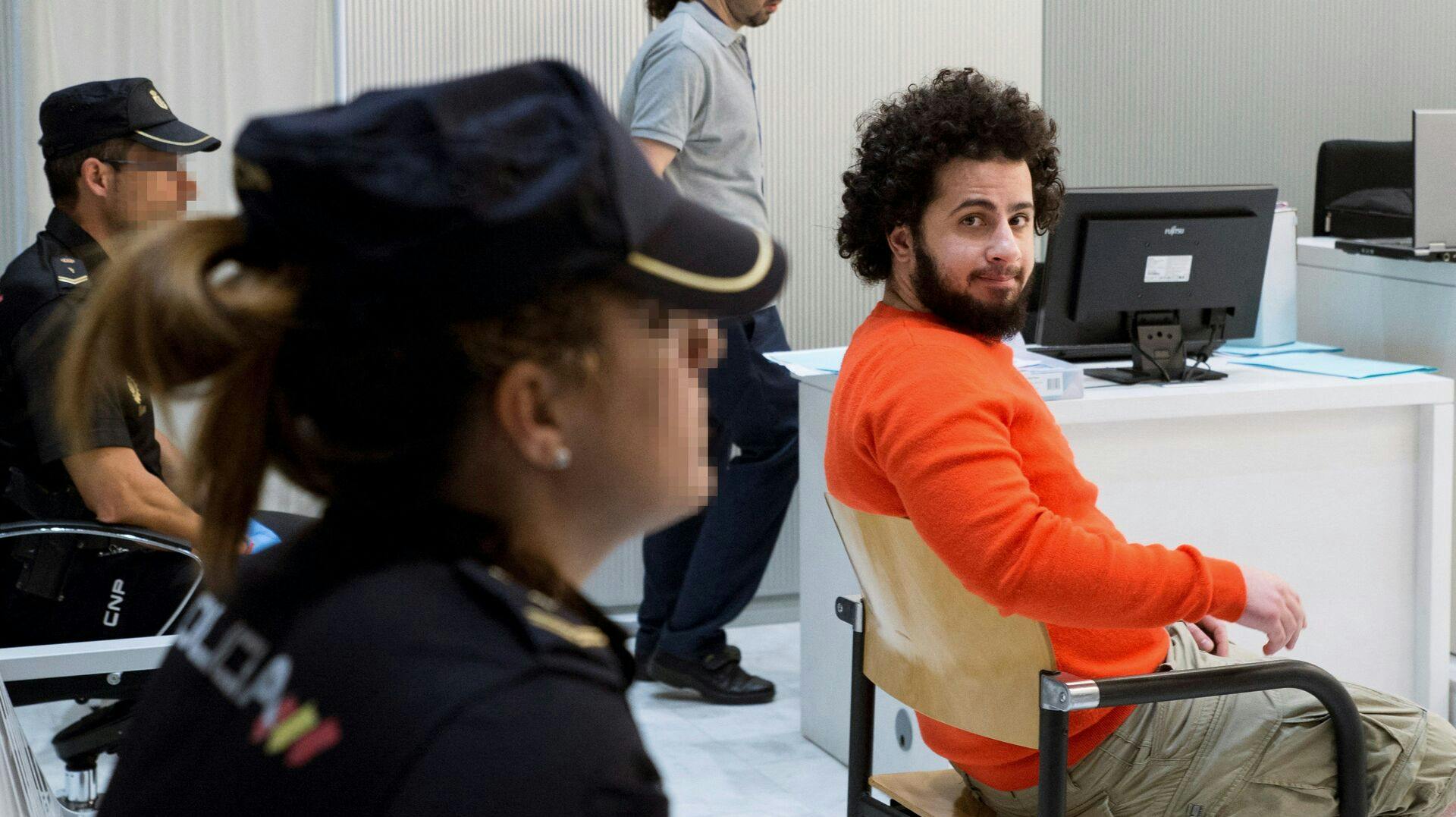 Danish Ahmed Samsam poses at a court in Madrid on June 12, 2018 during his trial on charges of having fought in the ranks of the Islamic State for more than three years. Luca Piergiovanni / POOL / AFP
