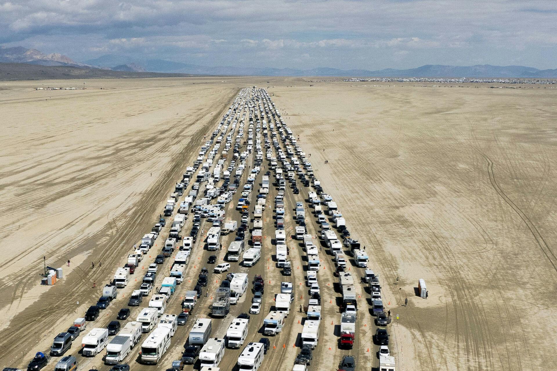 Vehicles are seen departing the Burning Man festival in Black Rock City, Nevada, U.S., September 4, 2023. REUTERS/Matt Mills McKnight TPX IMAGES OF THE DAY