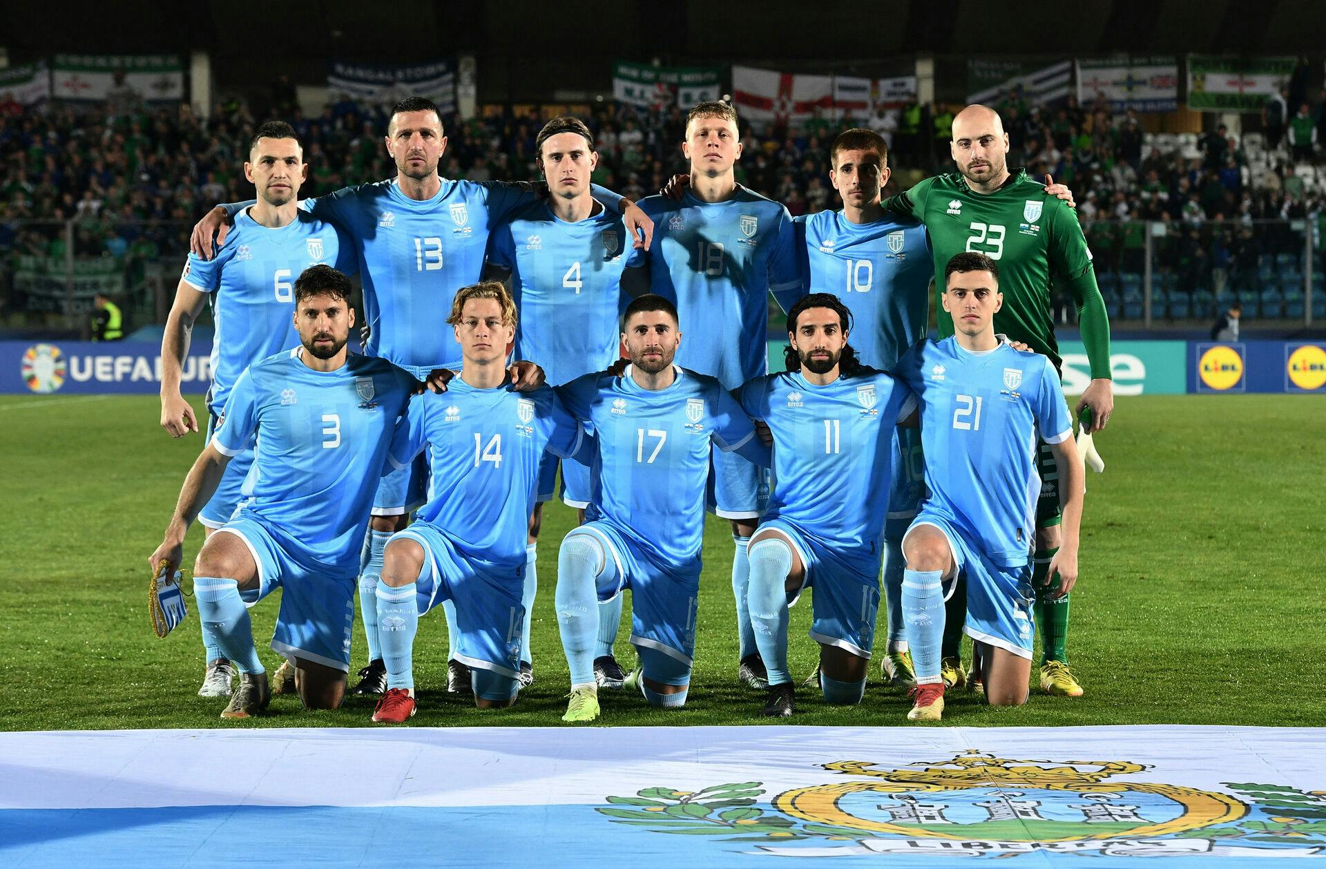 Soccer Football - UEFA Euro 2024 Qualifiers - Group H - San Marino v Northern Ireland - San Marino Stadium, Serravalle, San Marino - March 23, 2023 San Marino players pose for a team group photo before the match REUTERS/Jennifer Lorenzini