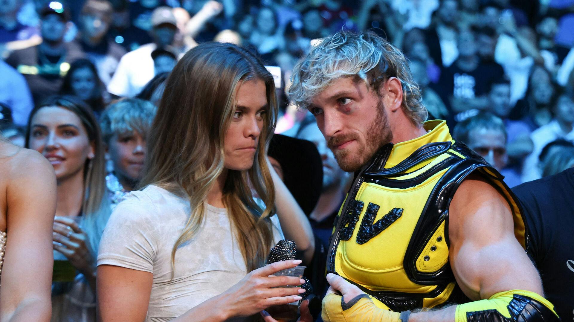 Aug 5, 2023; Dallas, Texas, USA; Logan Paul and fiance Nina Agdal watch Jake Paul fight against Nate Diaz in a boxing match at American Airlines Center. Mandatory Credit: Kevin Jairaj-USA TODAY Sports