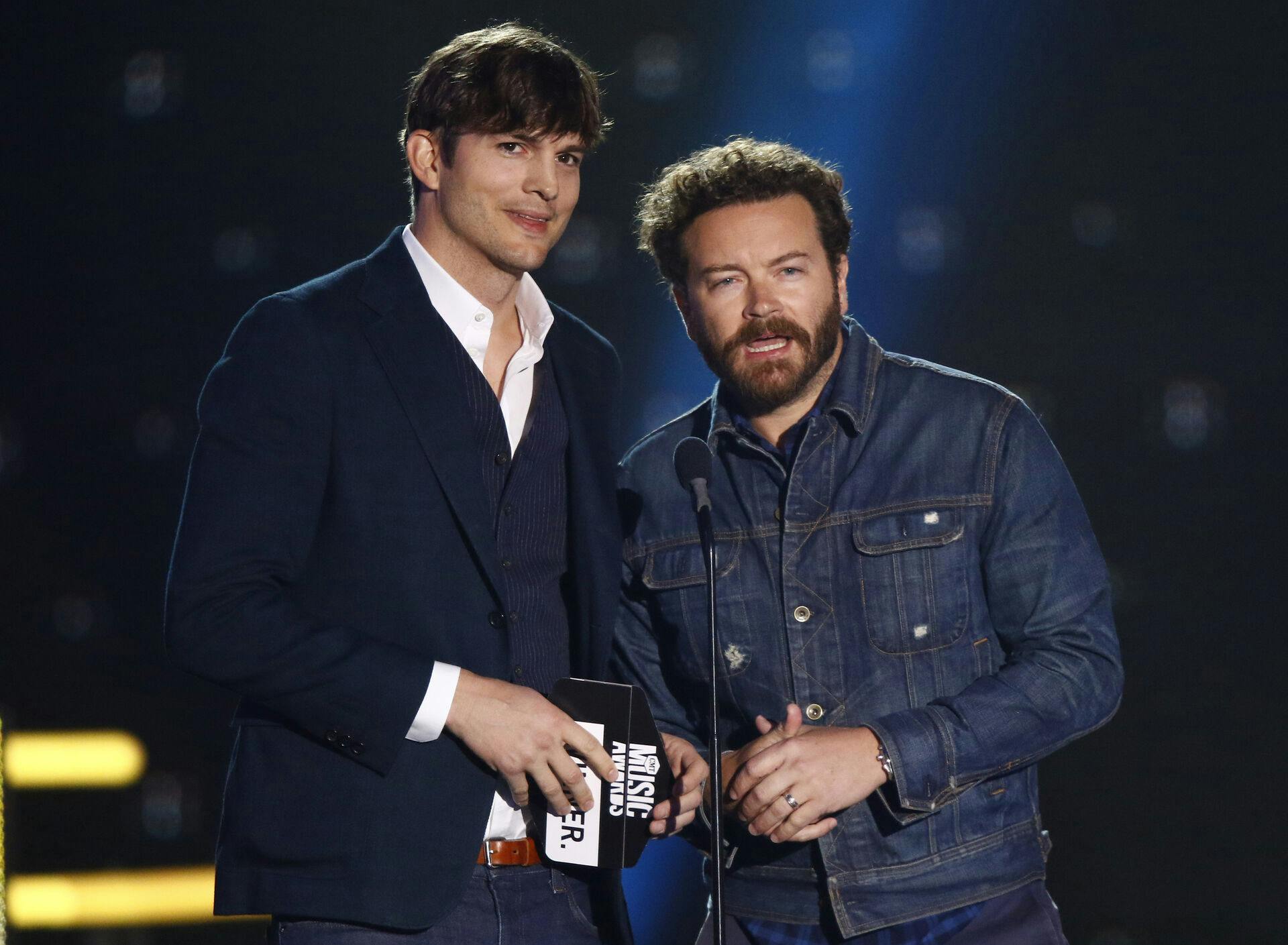 Ashton Kutcher, left, and Danny Masterson present the award for collaborative video of the year at the CMT Music Awards at Music City Center on Wednesday, June 7, 2017, in Nashville, Tenn. (Photo by Wade Payne/Invision/AP)