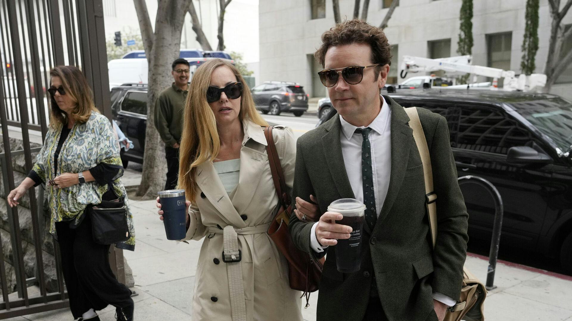 Danny Masterson and his wife Bijou Phillips arrive for closing arguments in his second rape trial, Tuesday, May 16, 2023, in Los Angeles. Masterson is charged with raping three women at his Los Angeles home between 2001 and 2003. (AP Photo/Chris Pizzello)