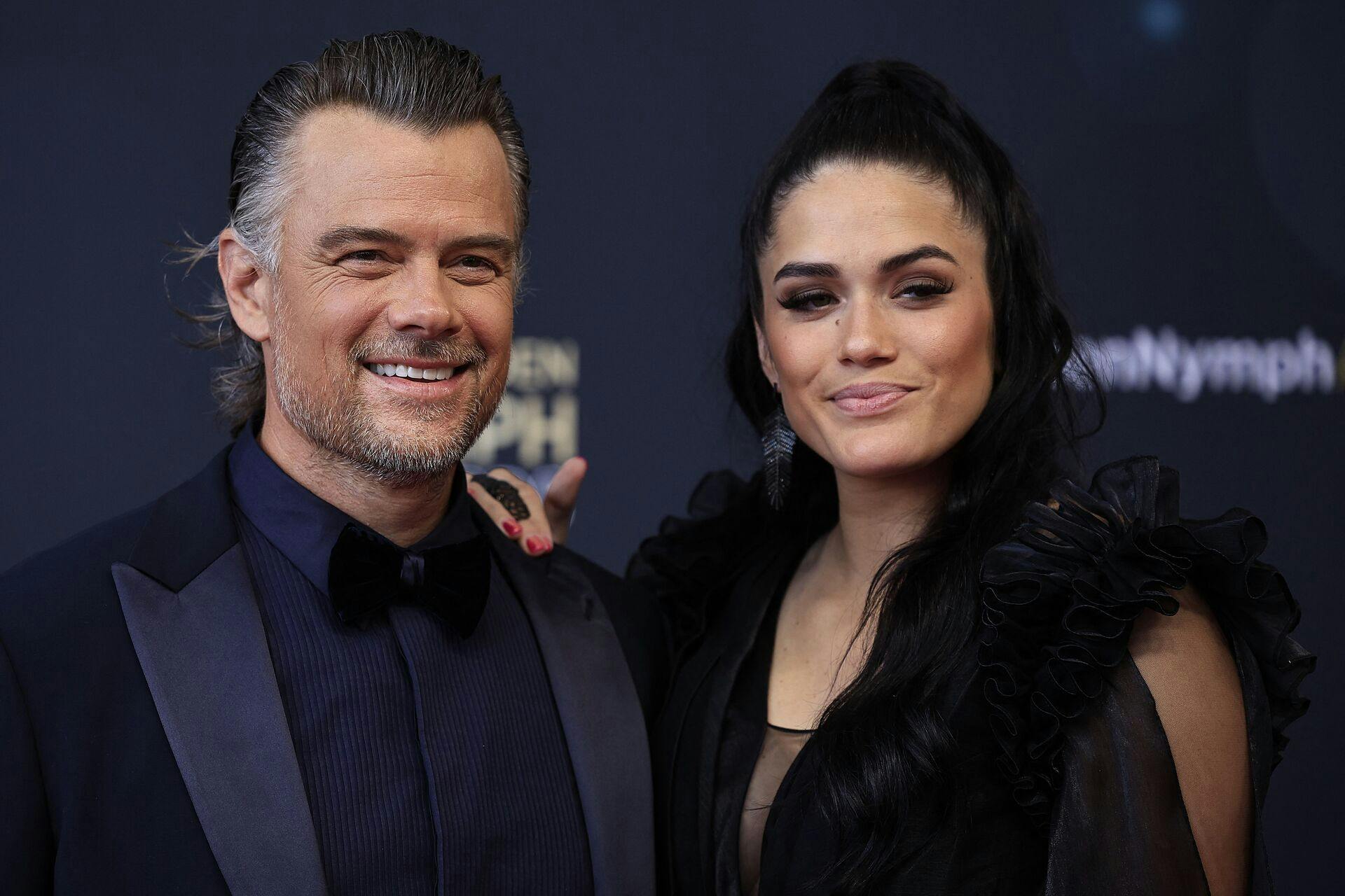 US actor Josh Duhamel (L) and his wife US model Audra Mari pose during a photocall for the Golden Nymph Awards ceremony of the 62nd Monte-Carlo Television Festival in the principalty of Monaco on June 20, 2023. The Golden Nymph Award is among the most prestigious prizes in international television. For the Fiction and News & Documentaries categories, it rewards the talent and creativity of the Official Selection. (Photo by Valery HACHE / AFP)