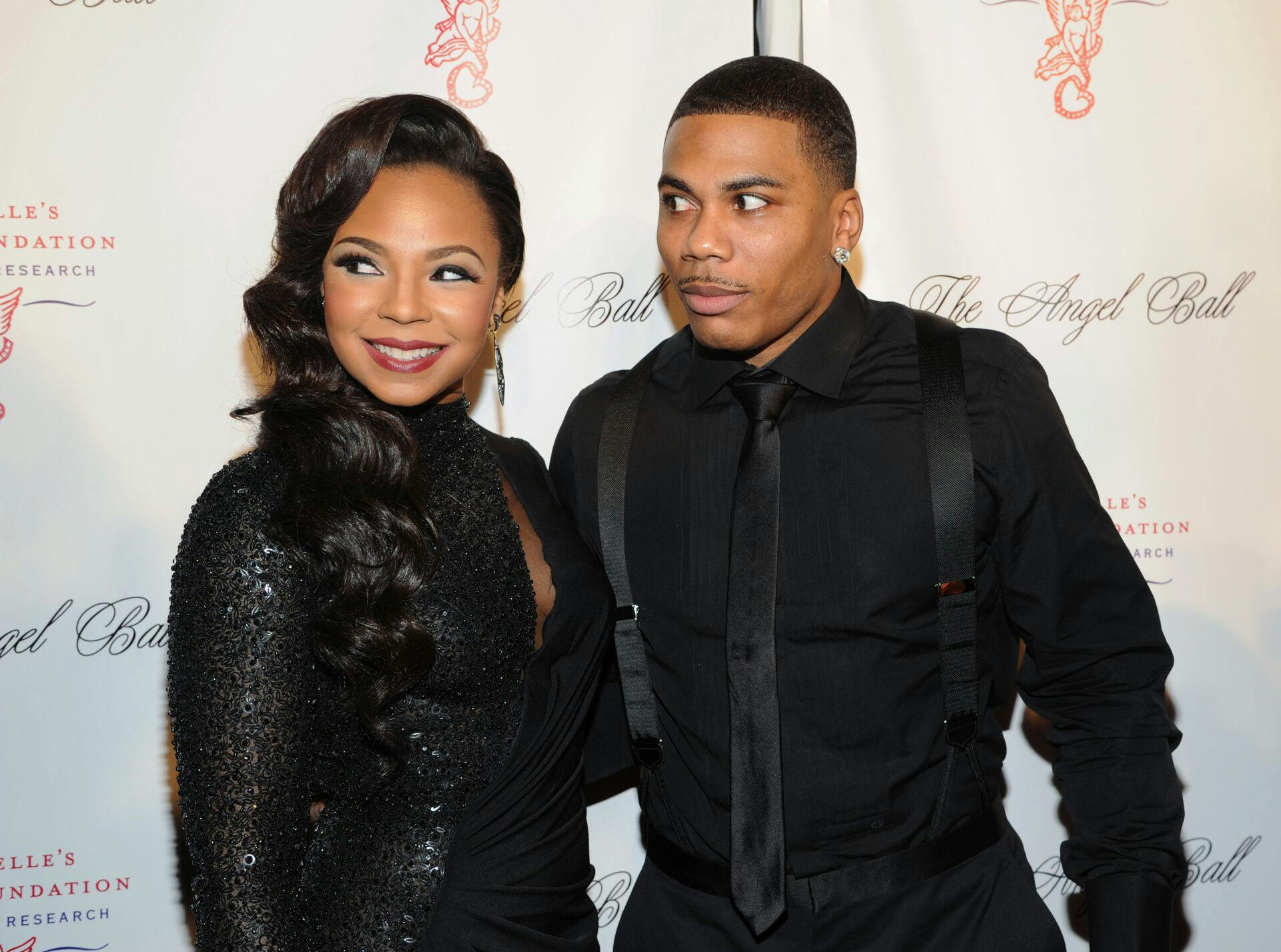 Singers Ashanti Douglas and Nelly attend Gabrielle's Angel Foundation 2012 Angel Ball cancer research benefit at Cipriani Wall Street on Monday Oct. 22, 2012 in New York. (Photo by Evan Agostini/Invision/AP)