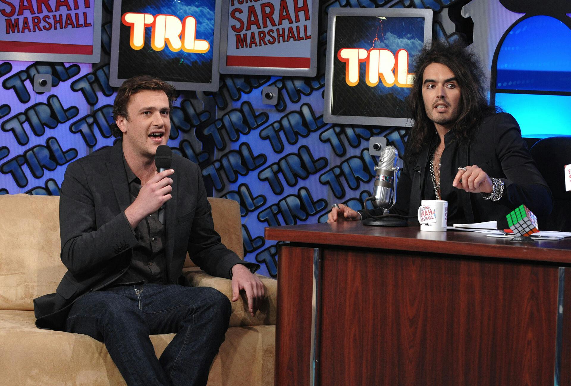 Actors Jason Segel, left, and Russell Brand make an appearance at MTV Studio's in Times Square for MTV's "Total Request Live" show on Tuesday, April 15, 2008, in New York. (AP Photo/Peter Kramer)