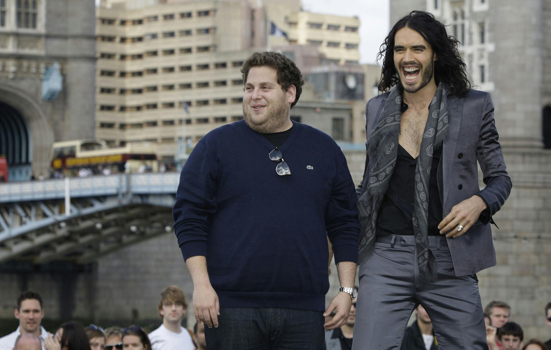 U.S actor Jonah Hill, left, and British actor Russell Brand promote their film Get him to the Greek, by Tower Bridge in central London, Sunday, June 20, 2010. (AP Photo/Joel Ryan)