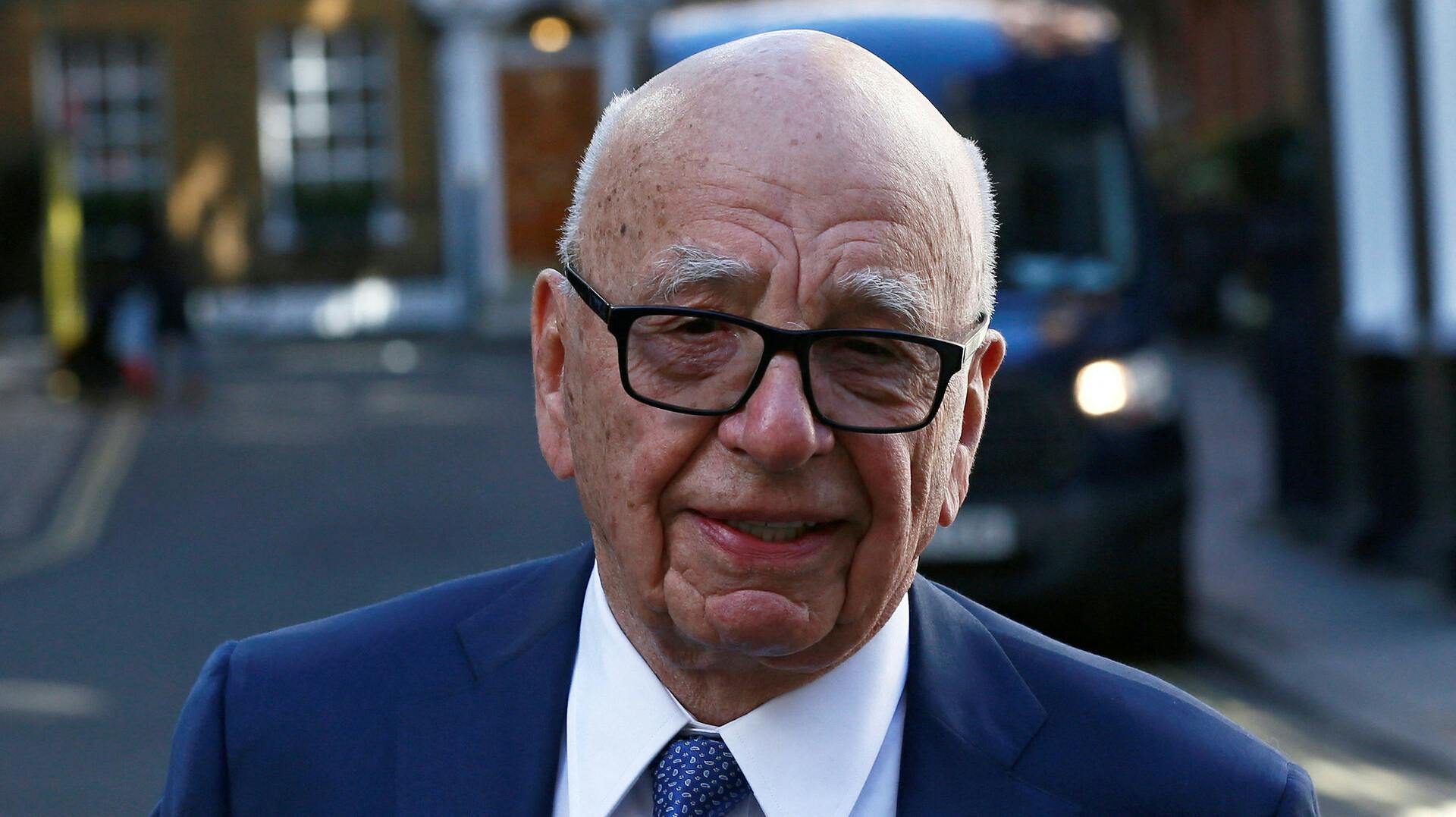 FILE PHOTO: Media mogul Rupert Murdoch leaves his home in London, Britain March 4, 2016. Murdoch wed former supermodel Jerry Hall in a low-key ceremony in central London on Friday, the fourth marriage for the media mogul. REUTERS/Stefan Wermuth/File Photo