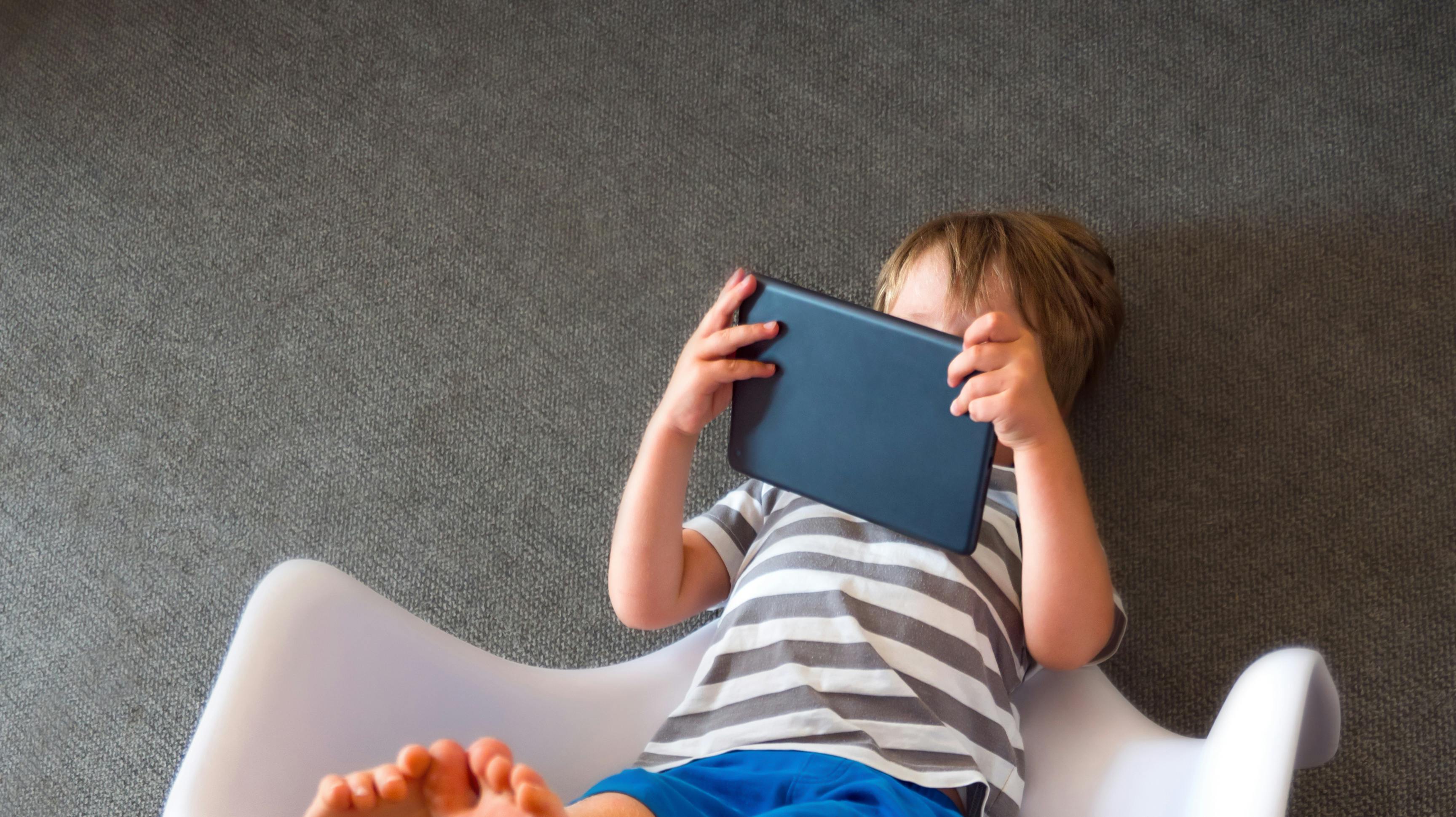 Boy with ipad. Children and gadgets. Kid with tablet. Alternative education concept. Social communication disorder. Digital future. Preschooler with wireless gadget. Alternative education