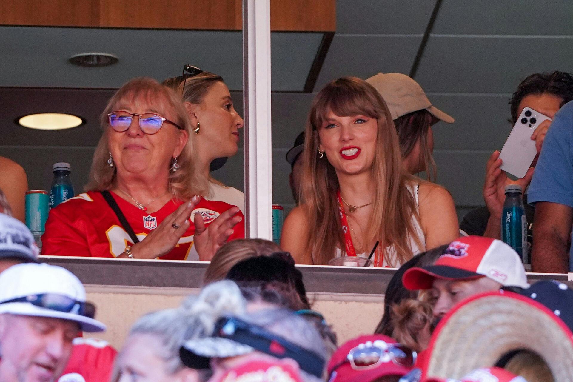 Sep 24, 2023; Kansas City, Missouri, USA; Taylor Swift reacts while sitting next to Donna Kelce watching the Kansas City Chiefs vs Chicago Bears game during the first half at GEHA Field at Arrowhead Stadium. Mandatory Credit: Denny Medley-USA TODAY Sports