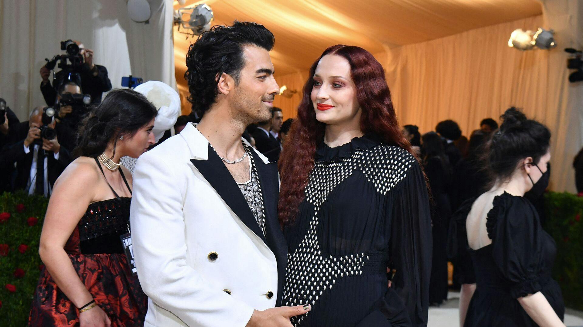 (FILES) US musician-actor Joe Jonas and wife