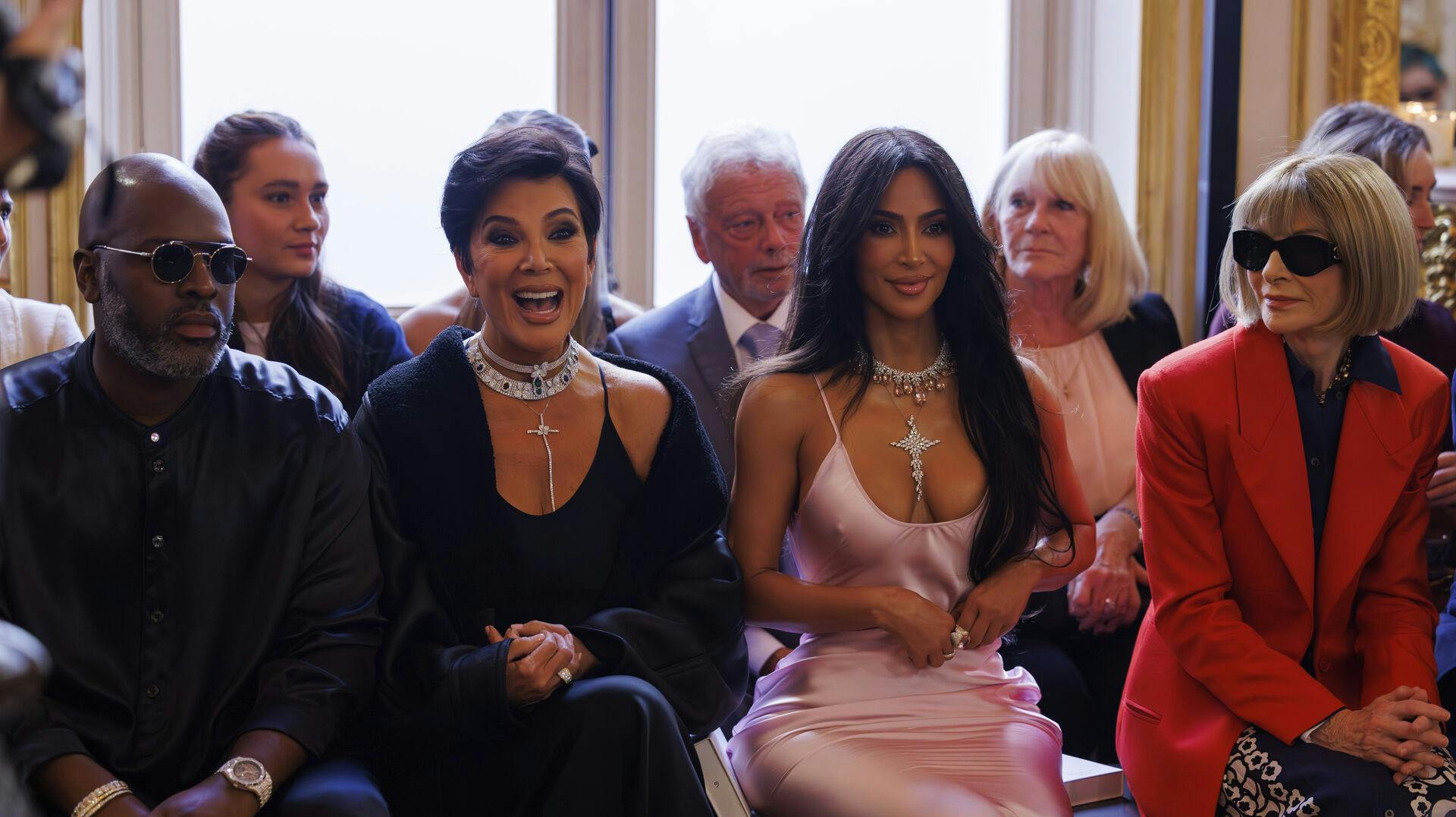 Corey Gamble, Kris Jenner, Kim Kardashian and Anna Wintour attend the Victoria Beckham Spring/Summer 2024 womenswear fashion collection presented Friday, Sept. 29, 2023 in Paris. (AP Photo/Vianney Le Caer)