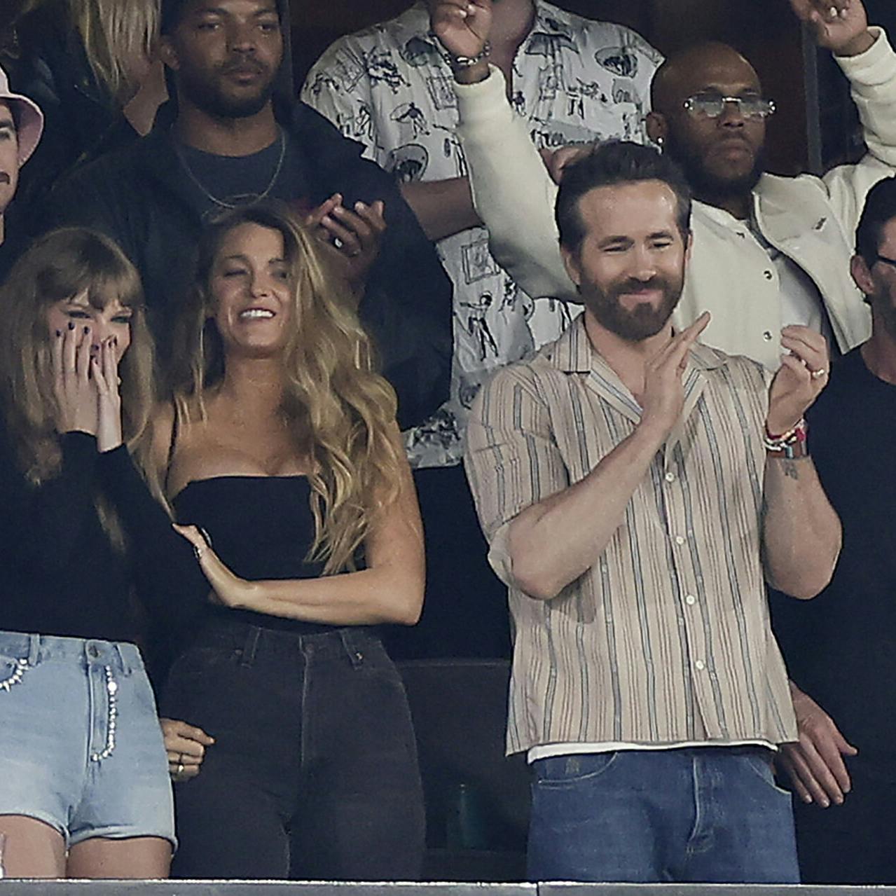 From left, Taylor Swift, Blake Lively and Ryan Reynolds react during the first quarter of an NFL football game between the New York Jets and the Kansas City Chiefs, Sunday, Oct. 1, 2023, in East Rutherford, N.J. (AP Photo/Adam Hunger)