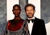 (L-R) British actress Jodie Turner-Smith and her husband, Canadian-US actor Joshua Jackson, attend the Vanity Fair 95th Oscars Party at the The Wallis Annenberg Center for the Performing Arts in Beverly Hills, California on March 12, 2023. (Photo by Michael TRAN / AFP)