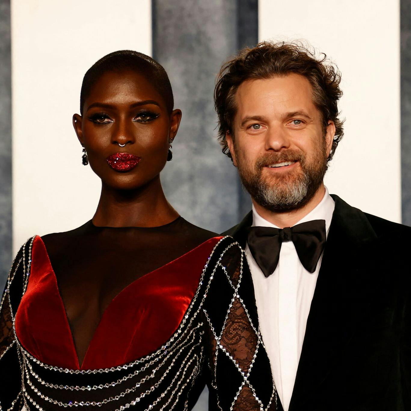 (L-R) British actress Jodie Turner-Smith and her husband, Canadian-US actor Joshua Jackson, attend the Vanity Fair 95th Oscars Party at the The Wallis Annenberg Center for the Performing Arts in Beverly Hills, California on March 12, 2023. (Photo by Michael TRAN / AFP)