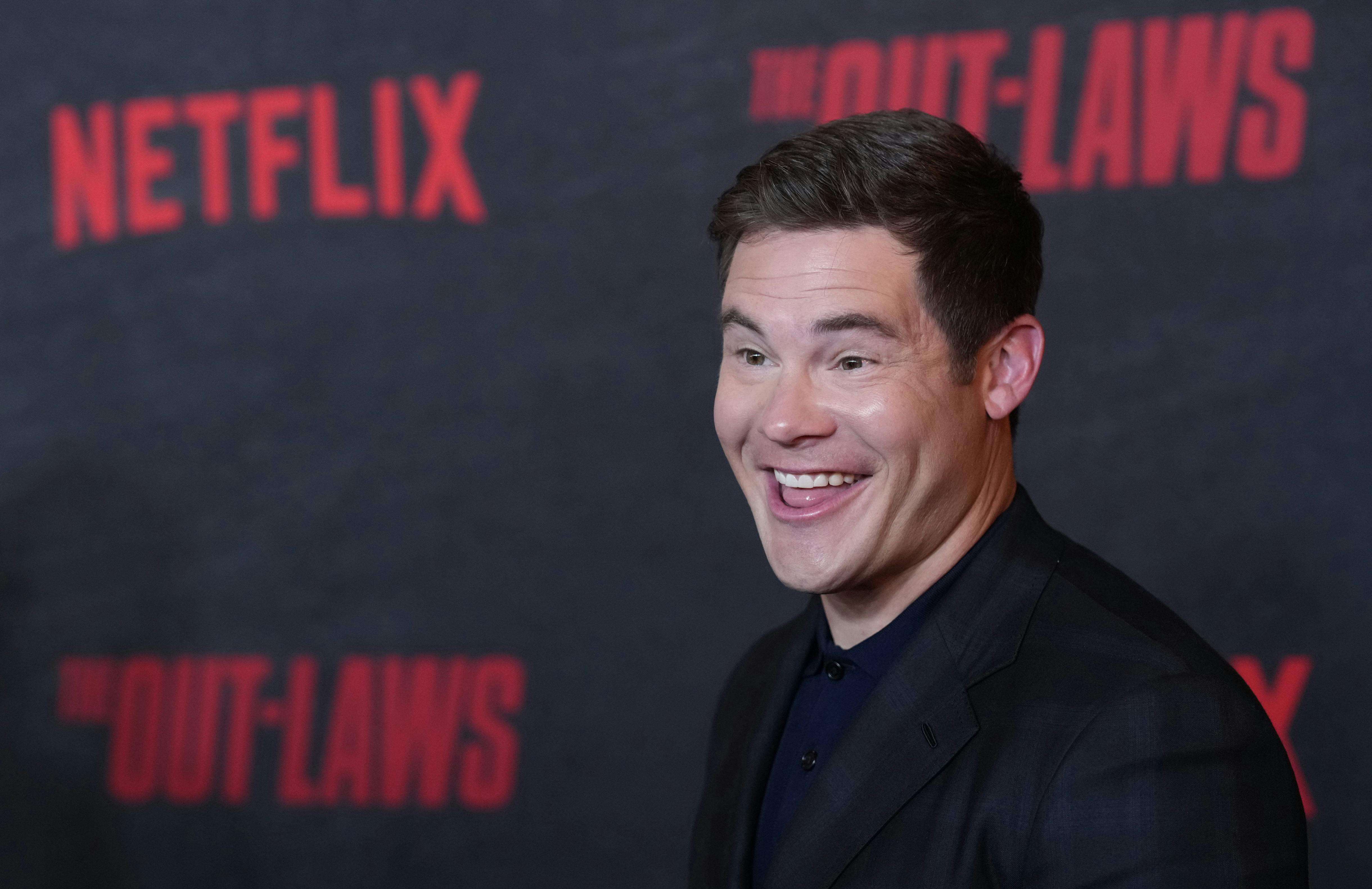 Adam Devine poses at a special screening of the film "The Out-Laws, " Monday, June 26, 2023, at the Regal LA Live theaters in Los Angeles. (AP Photo/Chris Pizzello)