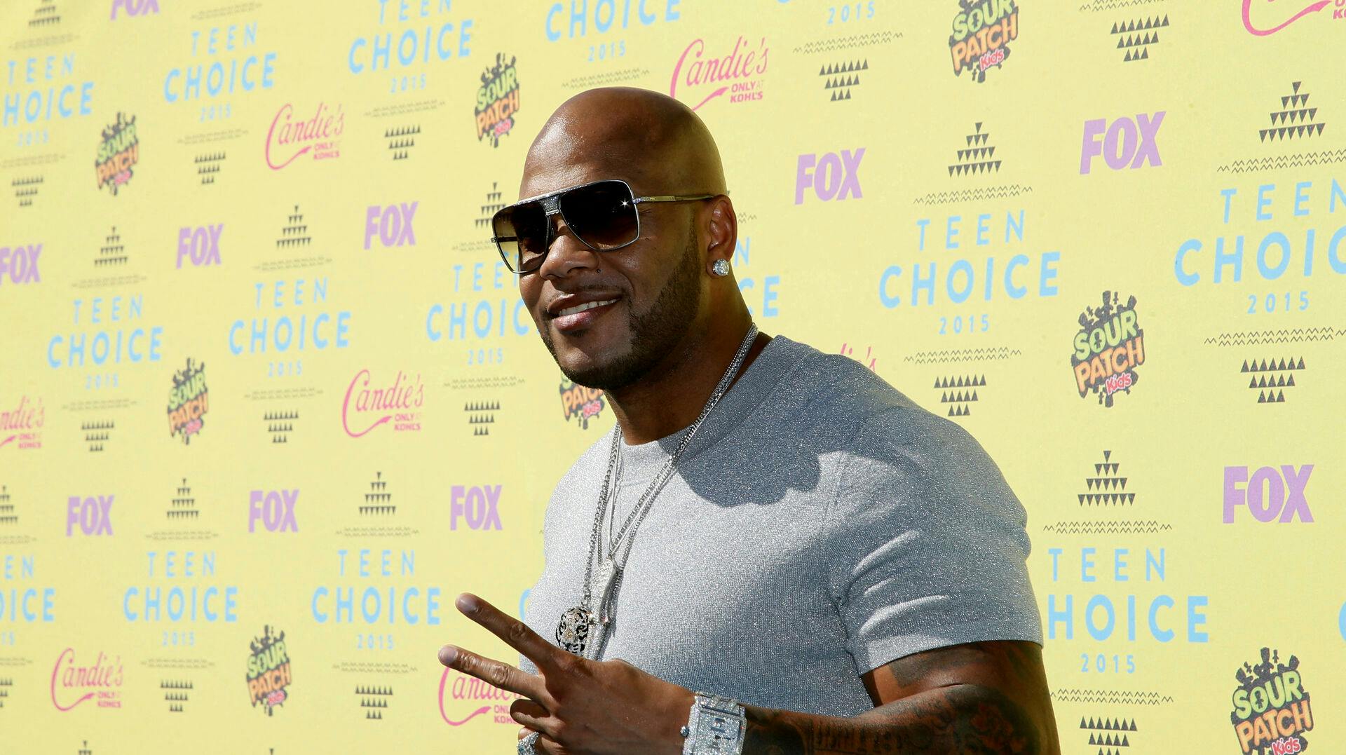 FILE PHOTO: Rapper Flo Rida arrives at the 2015 Teen Choice Awards in Los Angeles, California, United States August 16, 2015. REUTERS/Danny Moloshok/File Photo