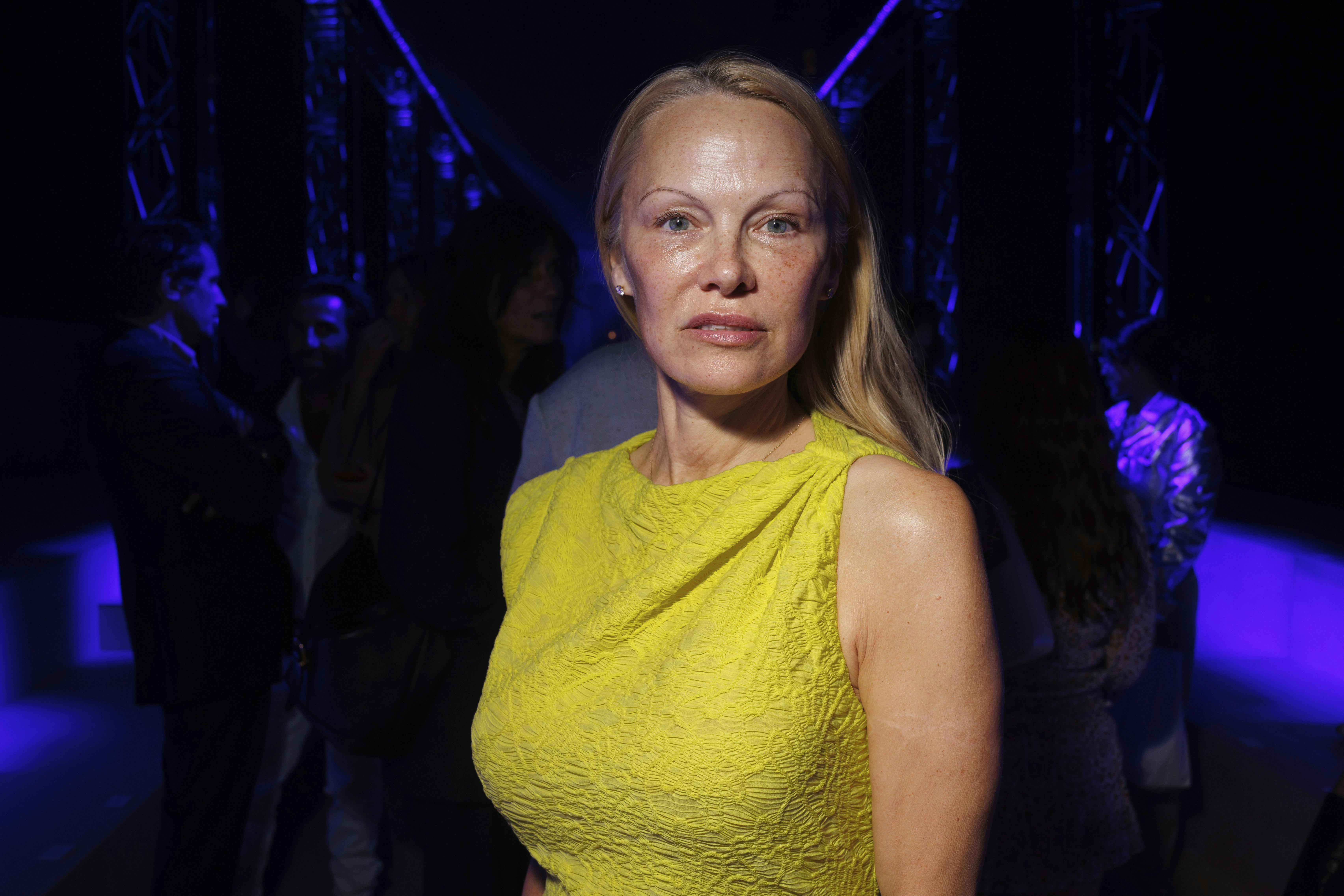 Pamela Anderson attends the Isabel Marant Spring/Summer 2024 womenswear fashion collection presented Thursday, Sept. 28, 2023 in Paris. (AP Photo/Vianney Le Caer)