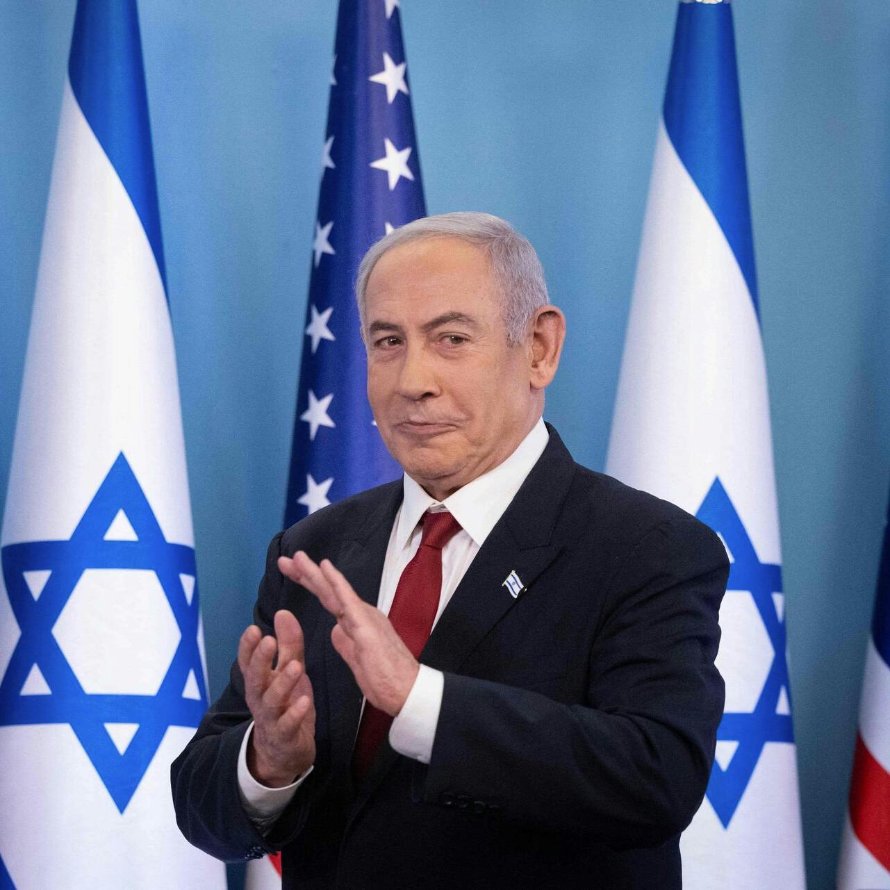 Israeli Prime Minister Benjamin Netanyahu reacts during an event marking the acceptance of Israel into the United States government's visa waiver program, in Jerusalem on September 28, 2023. (Photo by Chaim Goldberg / POOL / AFP)