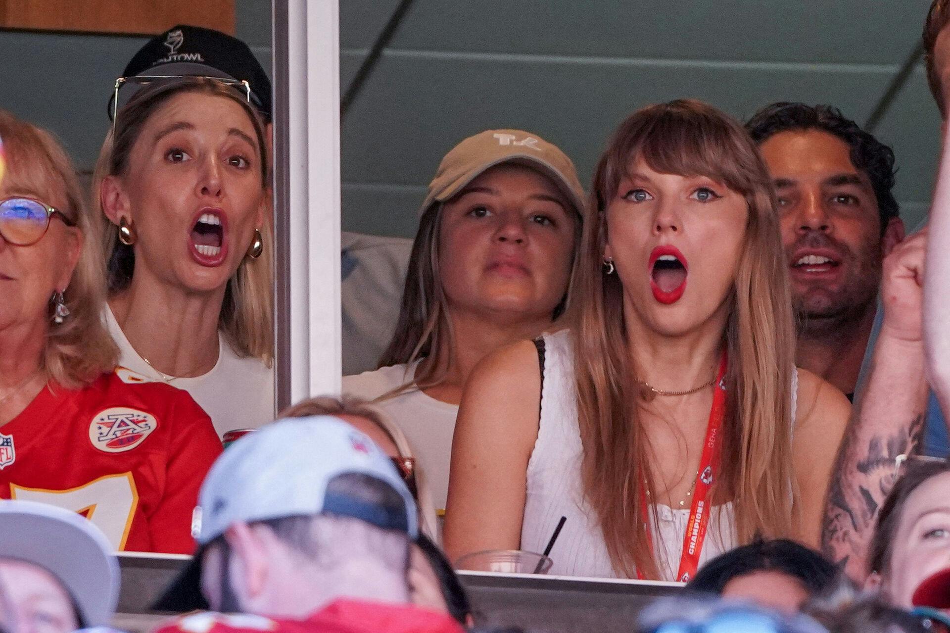 FILE PHOTO: Sep 24, 2023; Kansas City, Missouri, USA; Recording artist Taylor Swift cheers against the Chicago Bears during the game at GEHA Field at Arrowhead Stadium. Mandatory Credit: Denny Medley-USA TODAY Sports/File Photo
