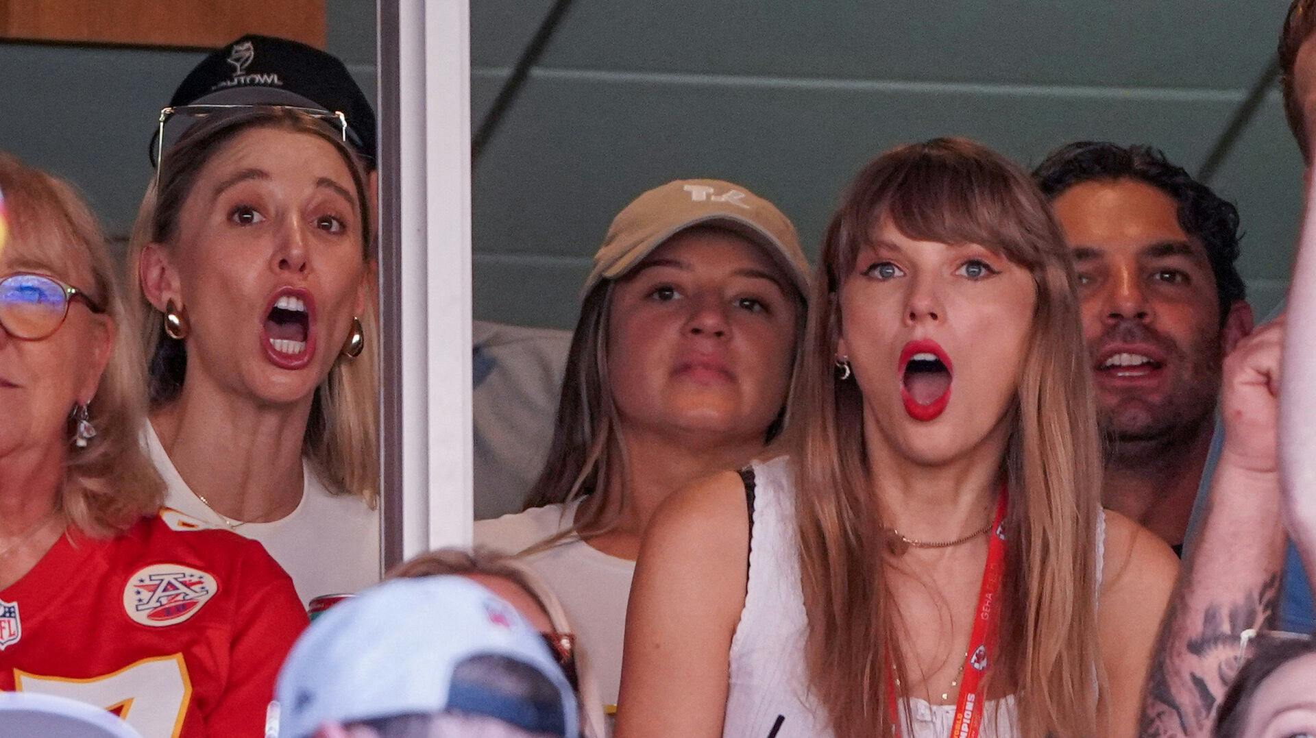 FILE PHOTO: Sep 24, 2023; Kansas City, Missouri, USA; Recording artist Taylor Swift cheers against the Chicago Bears during the game at GEHA Field at Arrowhead Stadium. Mandatory Credit: Denny Medley-USA TODAY Sports/File Photo