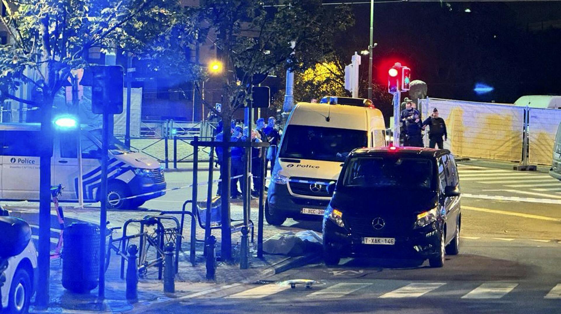 Police cordon off an area where a shooting took place in the center of Brussels, Monday, Oct. 16, 2023. (AP Photo/Sylvain Plazy)
