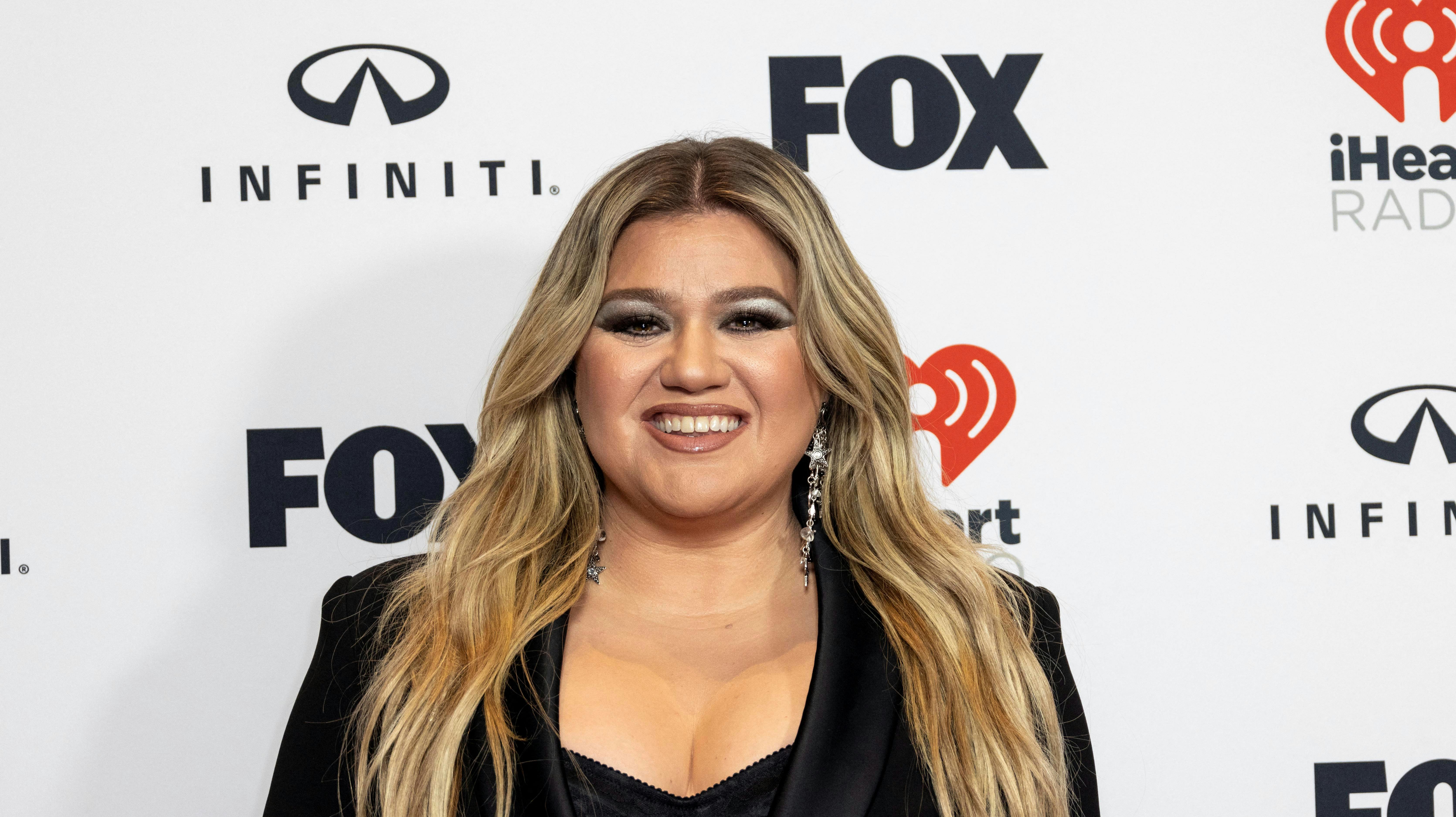 Kelly Clarkson poses during the iHeartRadio Music Awards in Los Angeles, California, U.S. March 27, 2023. REUTERS/Aude Guerrucci