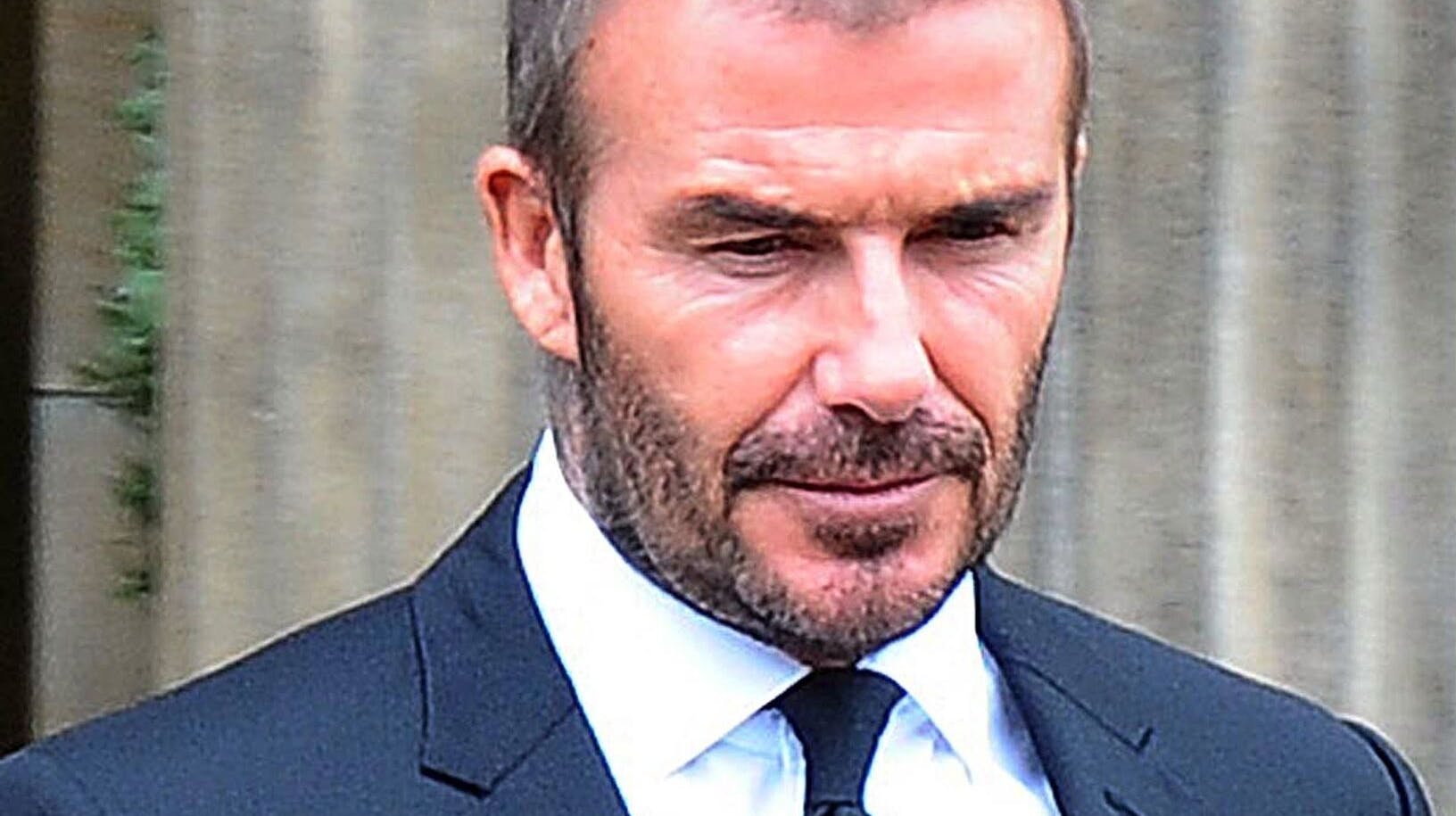 David Beckham på vej fra hotellet til begravelse.