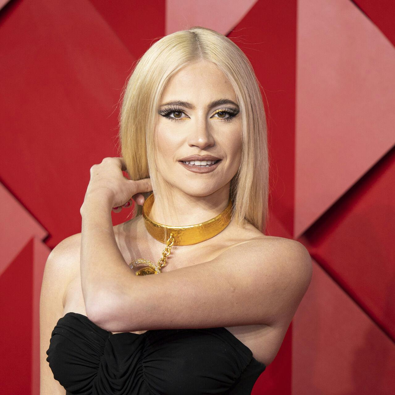 Pixie Lott poses for photographers upon arrival at the British Fashion Awards in London, Monday, Dec. 5, 2022. (Photo by Vianney Le Caer/Invision/AP)