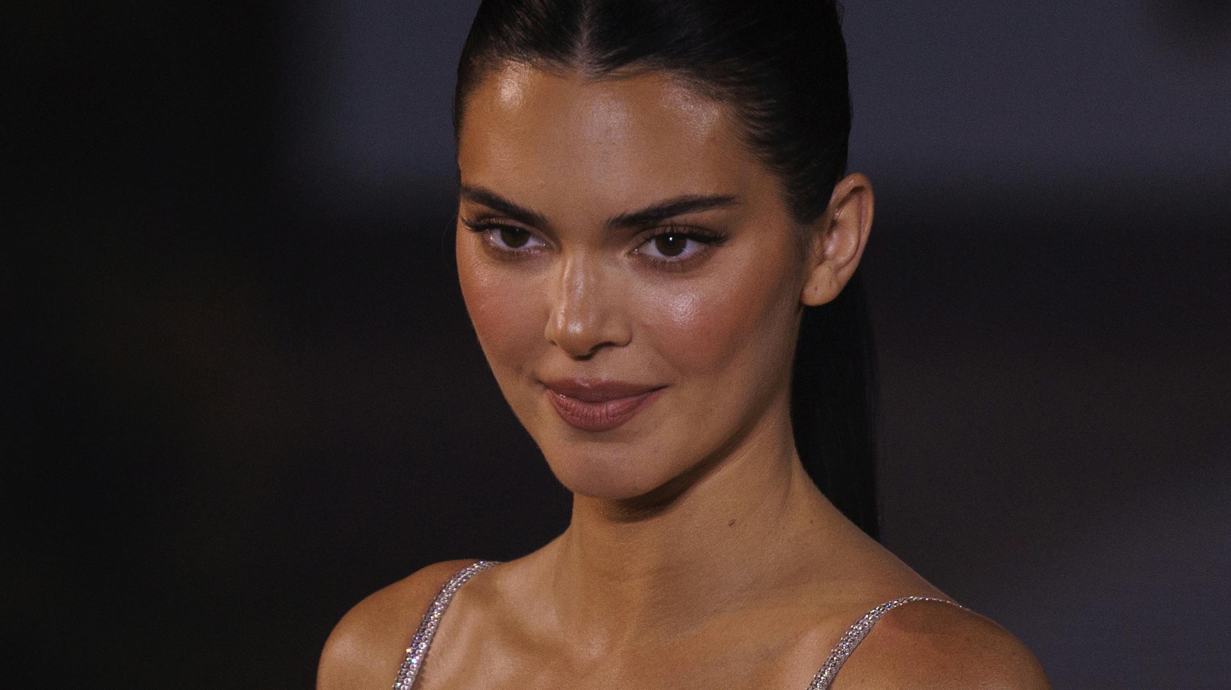 Kendall Jenner wears a creation for the L'Oreal Spring/Summer 2024 womenswear fashion collection presented Sunday, Oct. 1, 2023 in Paris. (AP Photo/Vianney Le Caer)