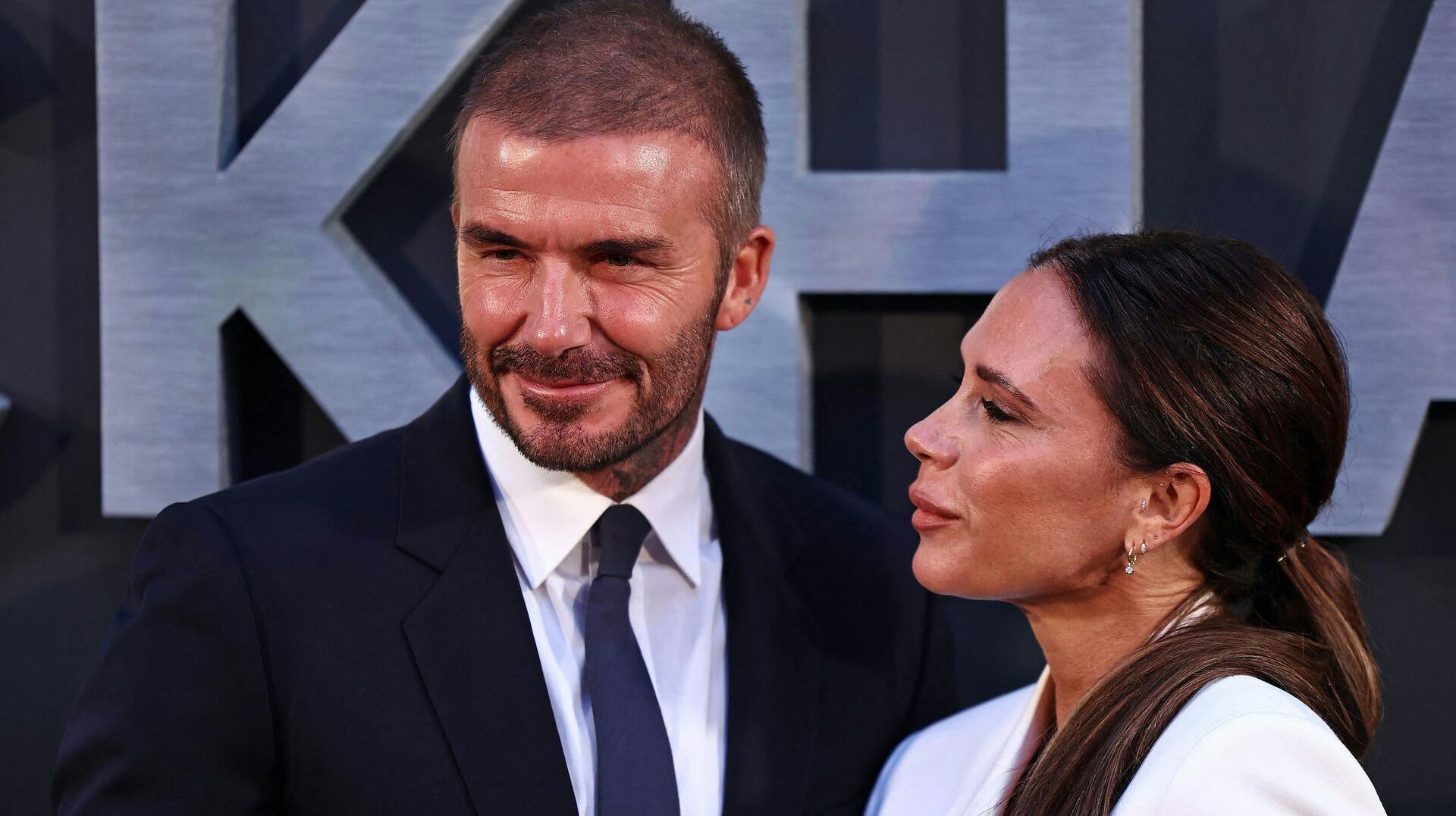 Former England footballer David Beckham and his wife Victoria Beckham pose on the red carpet upon arrival to attend the Premiere of "Beckham" in London on October 3, 2023. (Photo by HENRY NICHOLLS / AFP)