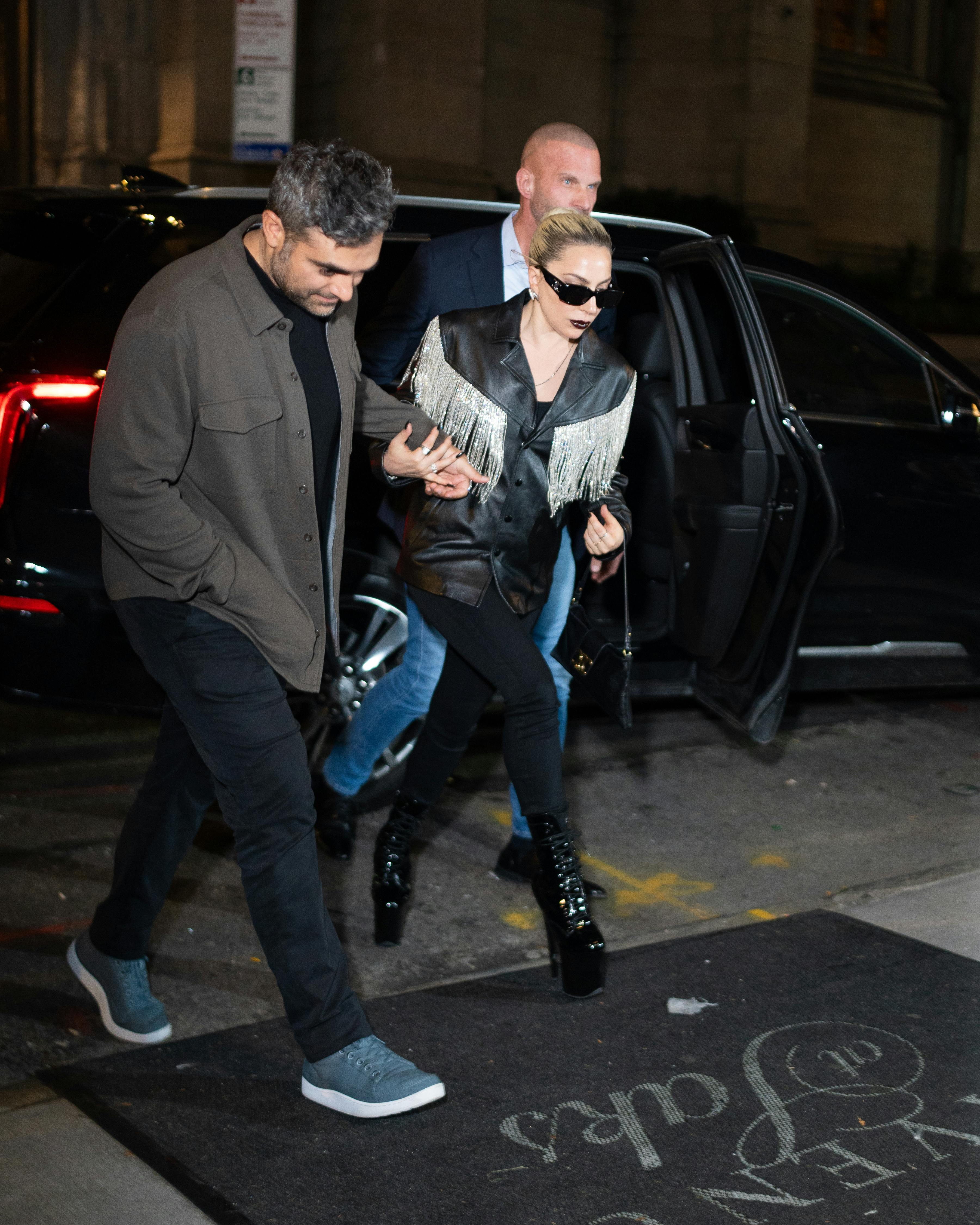 Lady Gaga spotted in new york arriving to snl after party with boyfriend. Pictured: Lady Gaga Ref: SPL9975955 221023 NON-EXCLUSIVE Picture by: STARTHESTAR / SplashNews.com Splash News and Pictures USA: 310-525-5808 UK: 020 8126 1009 eamteam@shutterstock.com World Rights, 