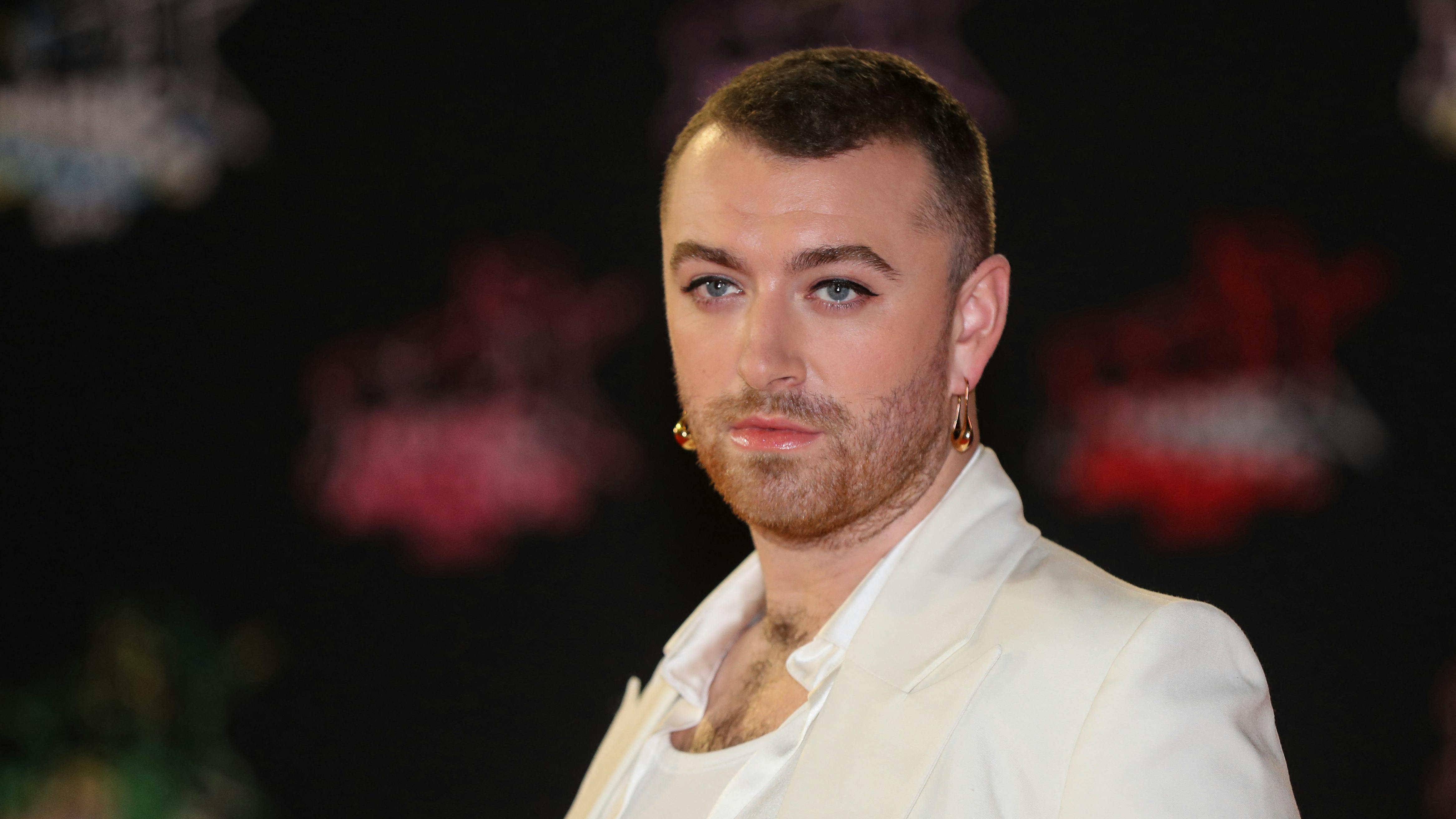 British singer Sam Smith poses on the red carpet as he arrives to attend the 21st NRJ Music Awards ceremony at the Palais des Festivals in Cannes, southeastern France, on November 9, 2019. Valery HACHE / AFP