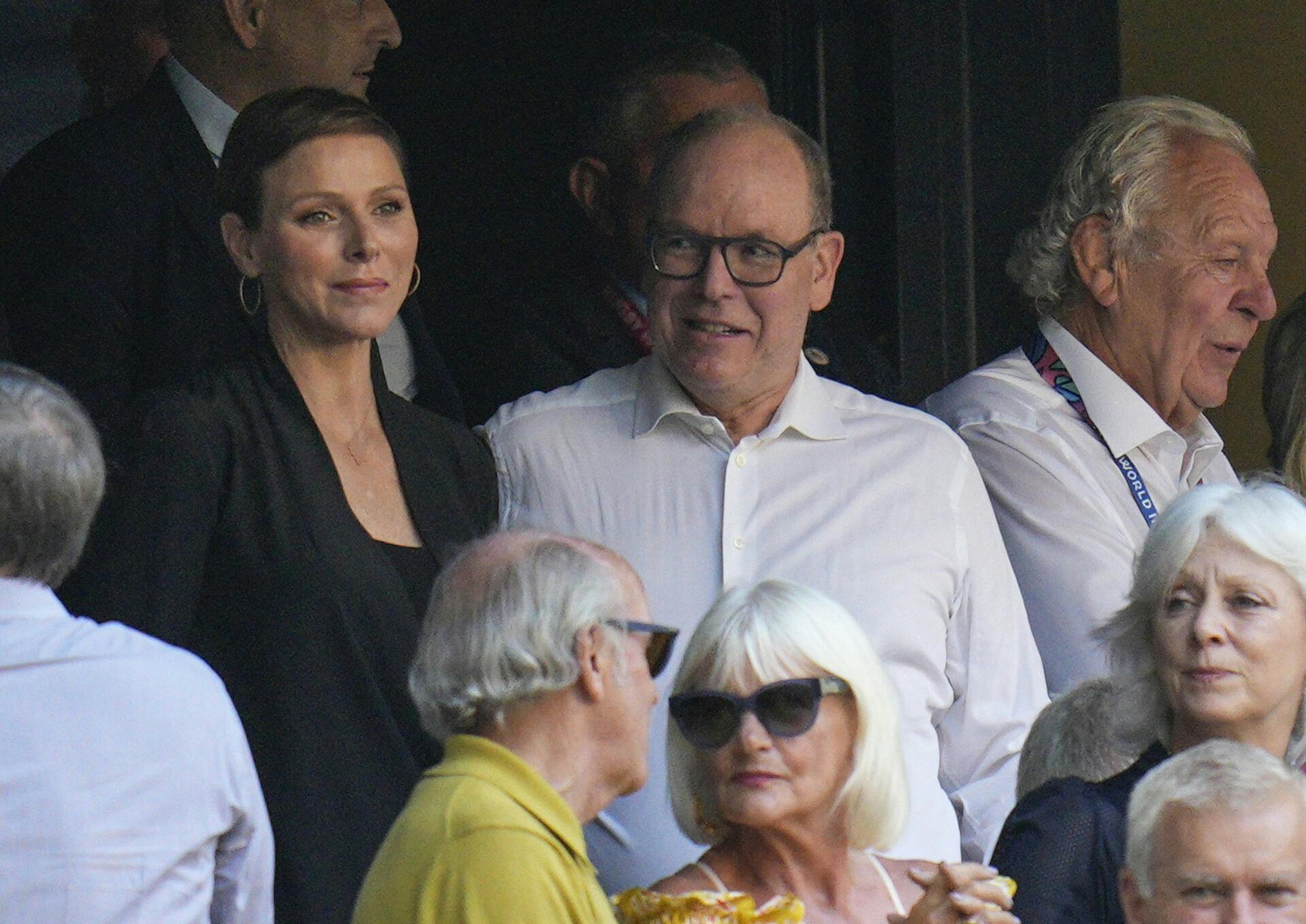 Prince Albert II of Monaco, right, and his wife Princess Charlene attend the Rugby World Cup Pool B match between South Africa and Scotland at the Stade de Marseille in Marseille, France, Sunday, Sept. 10, 2023. (AP Photo/Daniel Cole)