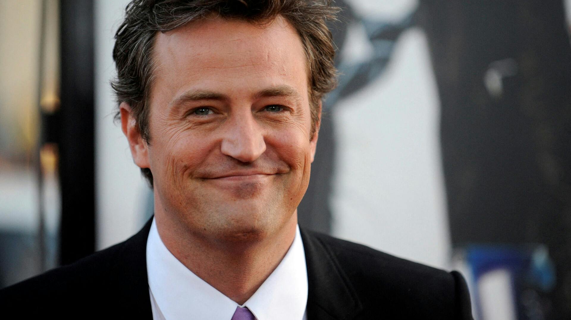 FILE PHOTO: Cast member Matthew Perry attends the premiere of the film "17 Again" in Los Angeles April 14, 2009. REUTERS/Phil McCarten/File Photo
