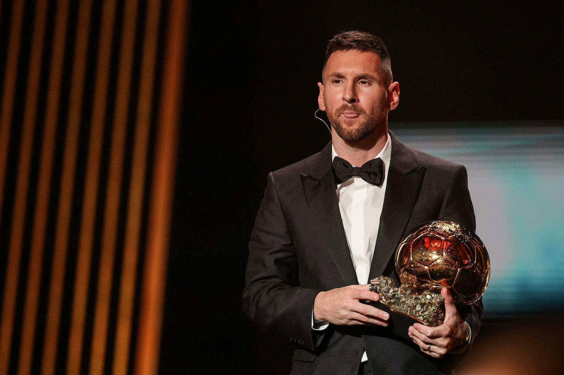 Inter Miami CF's Argentine forward Lionel Messi receives his 8th Ballon d'Or award during the 2023 Ballon d'Or France Football award ceremony at the Theatre du Chatelet in Paris on October 30, 2023. (Photo by FRANCK FIFE / AFP)