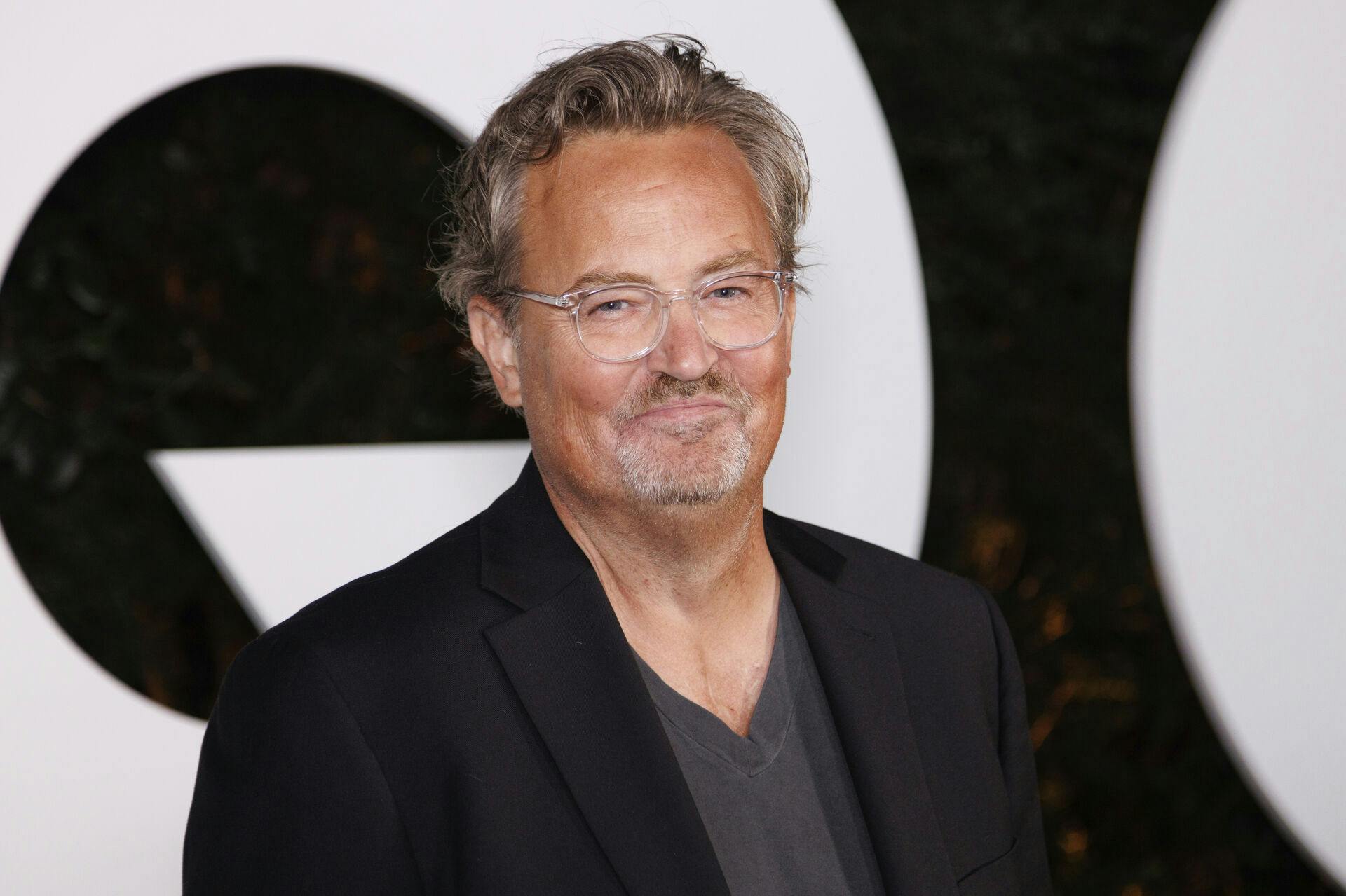 FILE - Matthew Perry arrives at the GQ Men of the Year Party