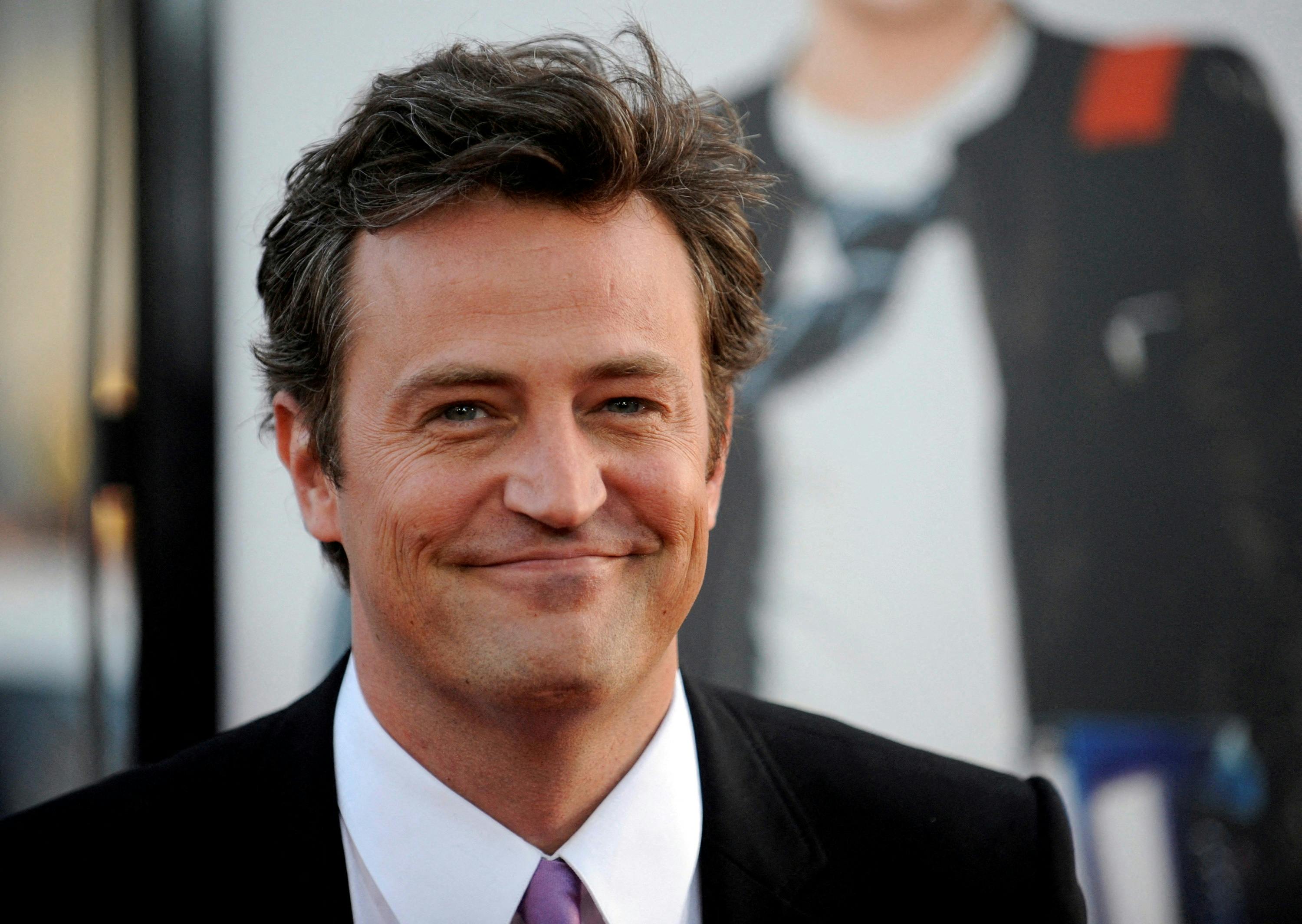 FILE PHOTO: Cast member Matthew Perry attends the premiere of the film "17 Again" in Los Angeles April 14, 2009. REUTERS/Phil McCarten/File Photo