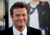 FILE PHOTO: Cast member Matthew Perry attends the premiere of the film "17 Again" in Los Angeles April 14, 2009. REUTERS/Phil McCarten/File Photo