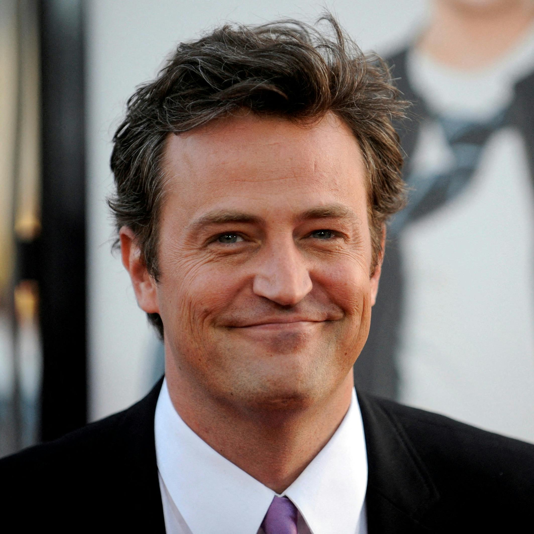 FILE PHOTO: Cast member Matthew Perry attends the premiere of the film "17 Again" in Los Angeles April 14, 2009. REUTERS/Phil McCarten/File Photo
