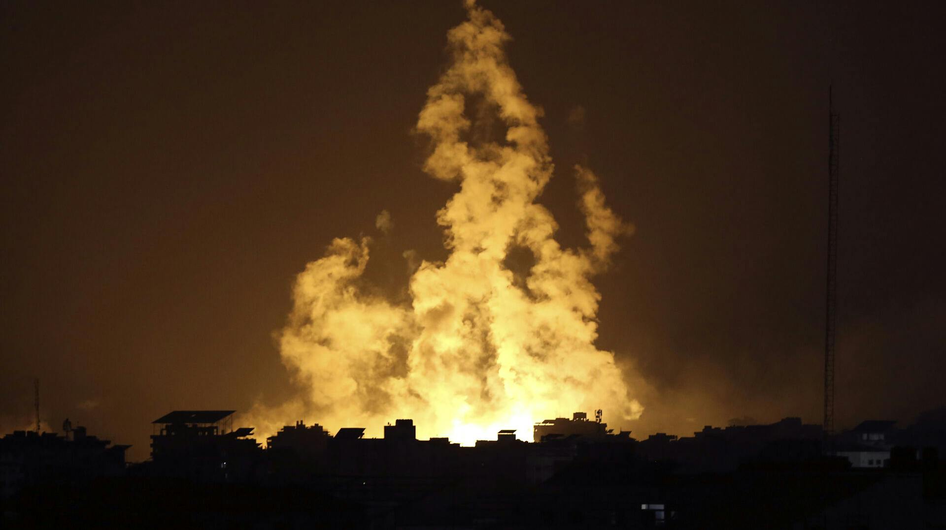 Fire and smoke rises from buildings following Israeli airstrikes on Gaza City, Sunday, Nov. 5, 2023. (AP Photo/Abed Khaled)
