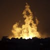 Fire and smoke rises from buildings following Israeli airstrikes on Gaza City, Sunday, Nov. 5, 2023. (AP Photo/Abed Khaled)