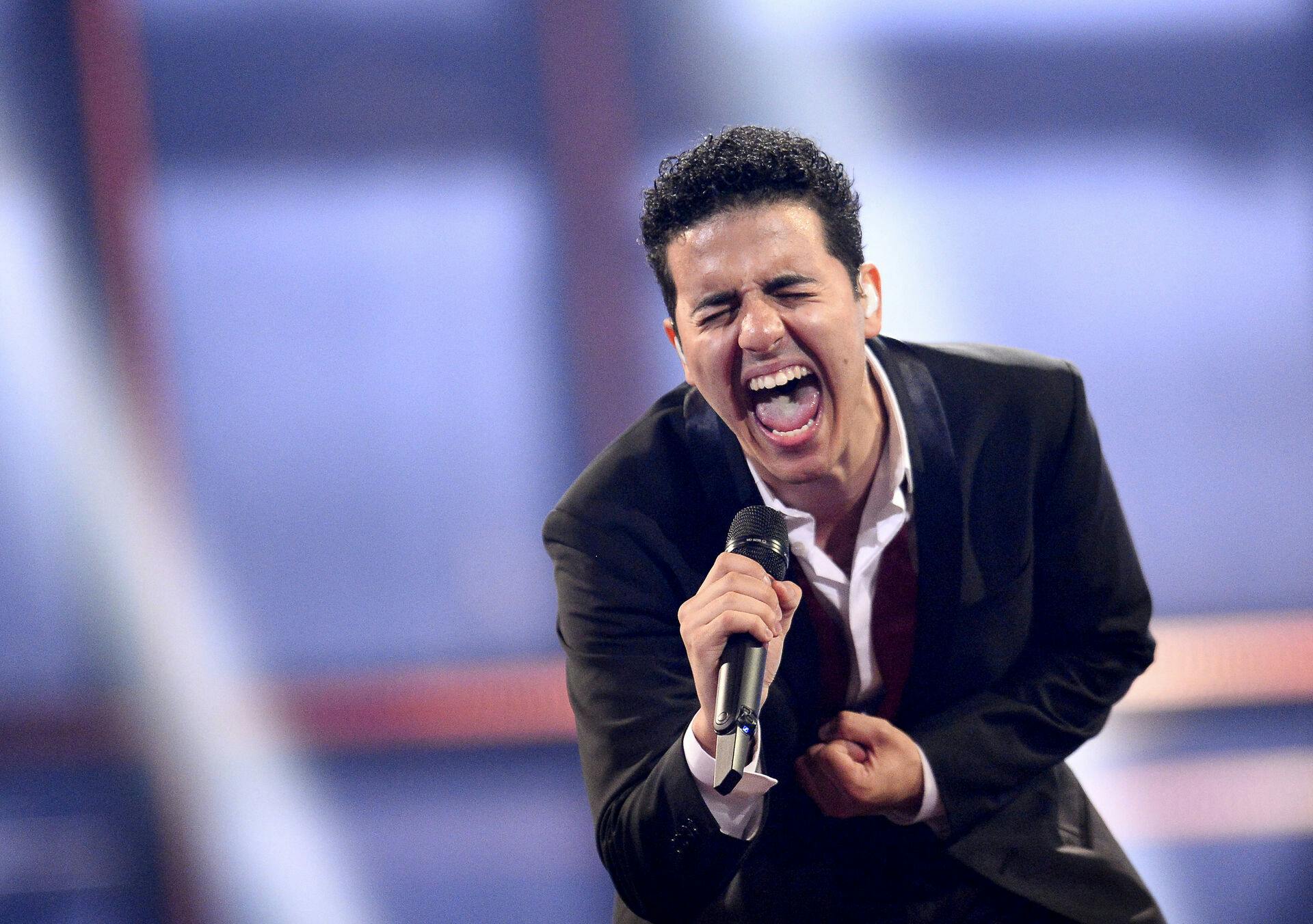 I 2014 sang Basim "Cliche Love Song" til Eurovision.