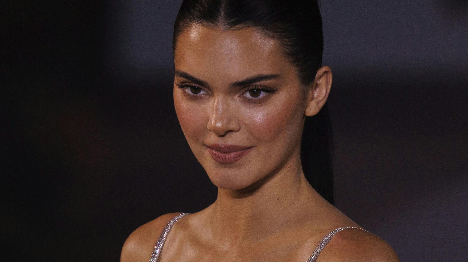 Kendall Jenner wears a creation for the L'Oreal Spring/Summer 2024 womenswear fashion collection presented Sunday, Oct. 1, 2023 in Paris. (AP Photo/Vianney Le Caer)