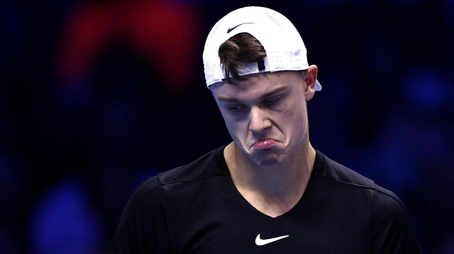 Tennis - ATP Finals - Pala Alpitour, Turin, Italy - November 16, 2023 Denmark's Holger Rune reacts during his group stage match against Italy's Jannik Sinner REUTERS/Guglielmo Mangiapane