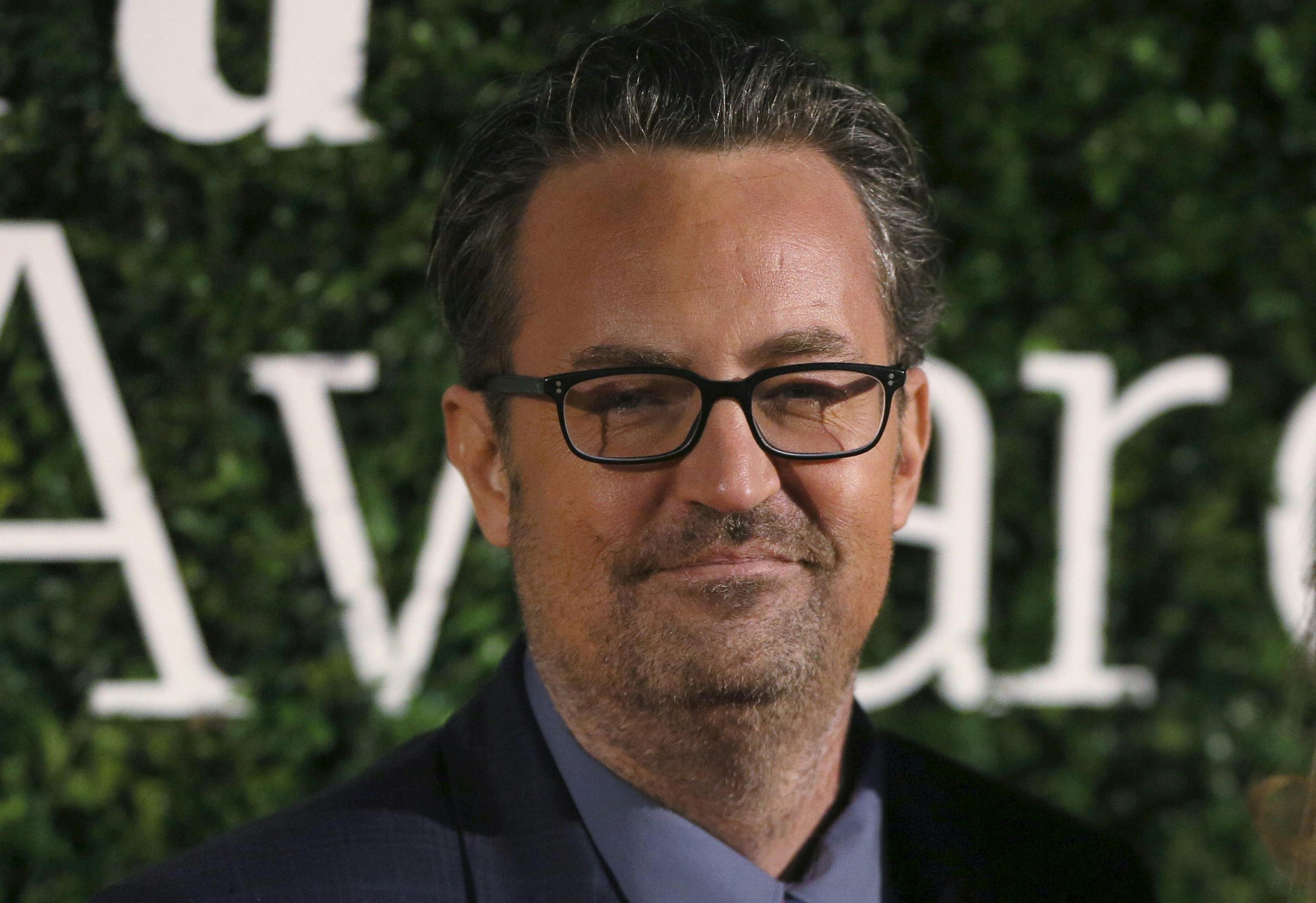 U.S. actor Matthew Perry poses for photographers at the Evening Standard British Film Awards in London, Britain, in this February 7, 2016 file picture. "Friends" star Matthew Perry swaps the television screen for the London stage in "The End of Longing, " his playwriting debut about four people feeling the pressures of life as they reach their forties. REUTERS/Neil Hall/Files