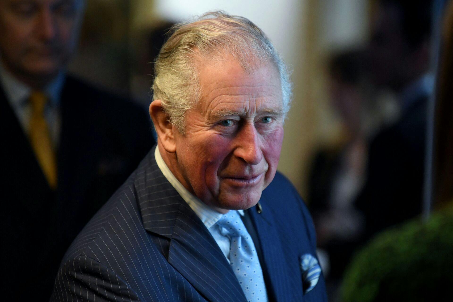 (FILES) In this file photo taken on February 13, 2020 Britain's Prince Charles, Prince of Wales gestures during a tour of the Cabinet Office in central London. - In a new documentary series set for release May 21, 2021 Prince Harry is once again emphasizing that his family turned a blind eye to the struggles of his wife Meghan Markle, saying he will "never be bullied into silence." (Photo by DANIEL LEAL-OLIVAS / various sources / AFP)